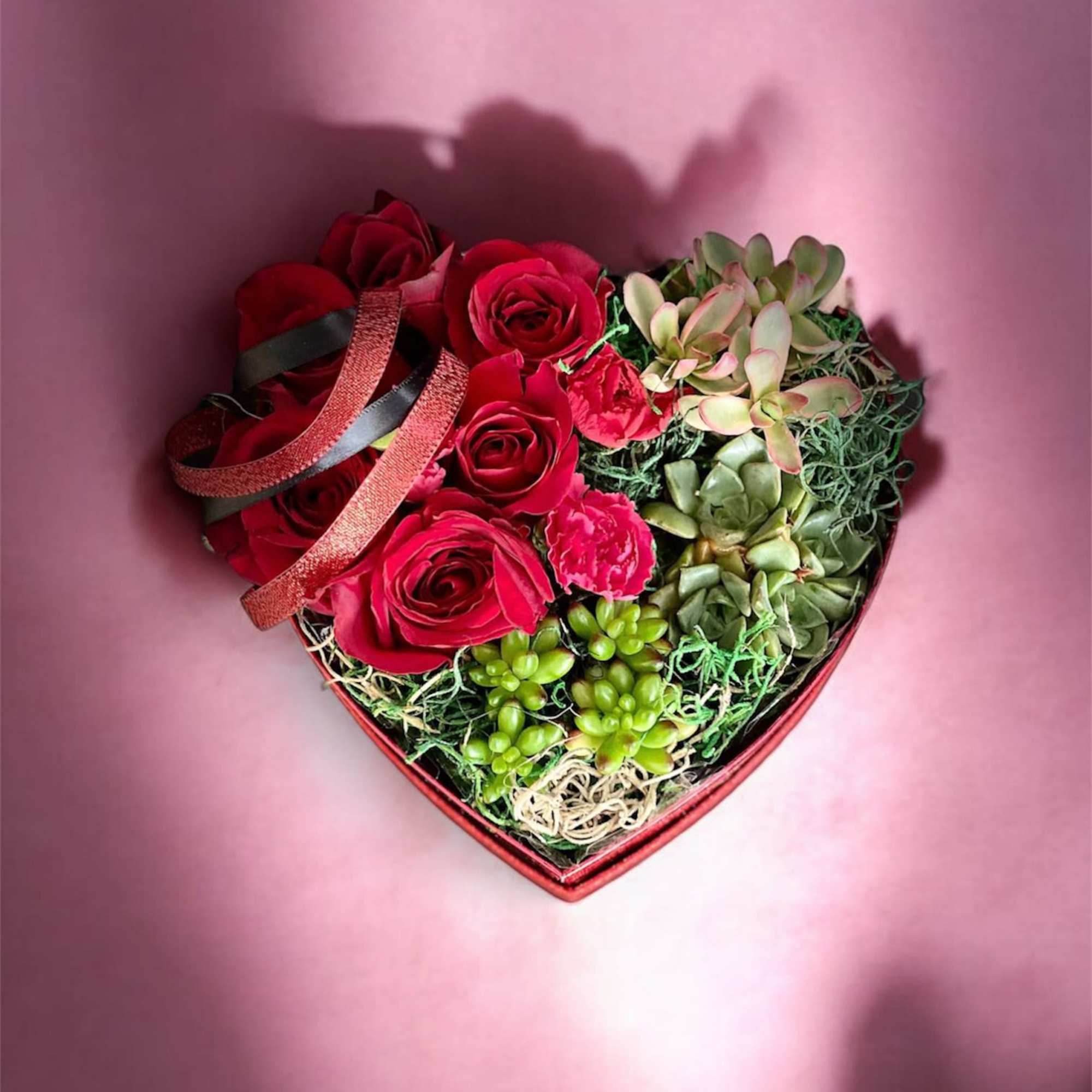 Elevate romance with our Heart-Shaped Box featuring a perfect union of velvety