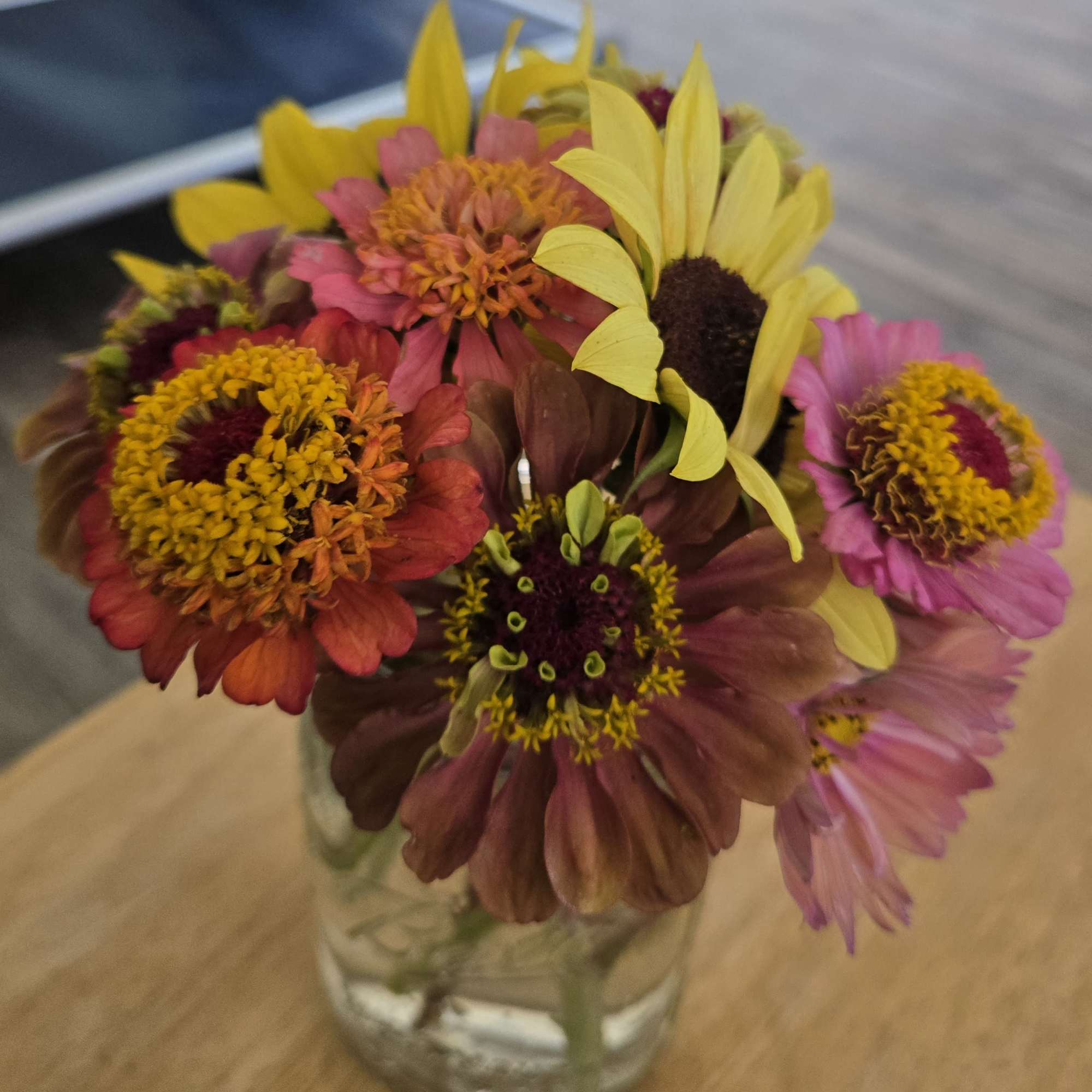 Varies by season and comes in a clear glass mason jar. Contains