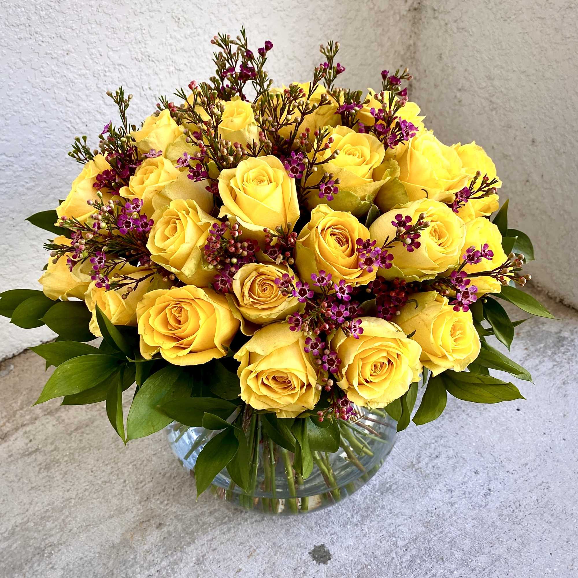 This luxury hand-tied arrangement contains roses and premium fillers beautifully laid out