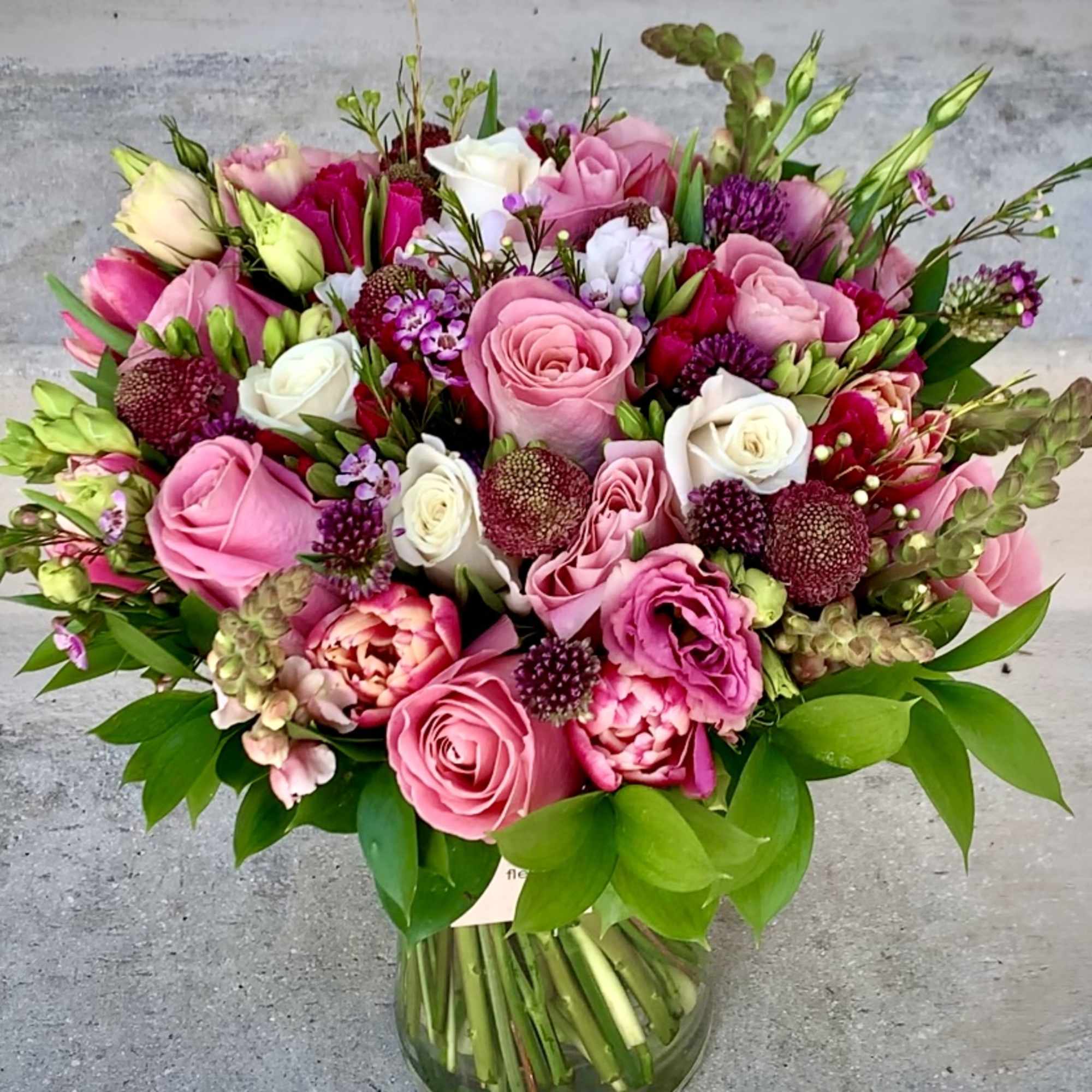 This luxury arrangement contains mixed florals such as roses, peonies, spray roses