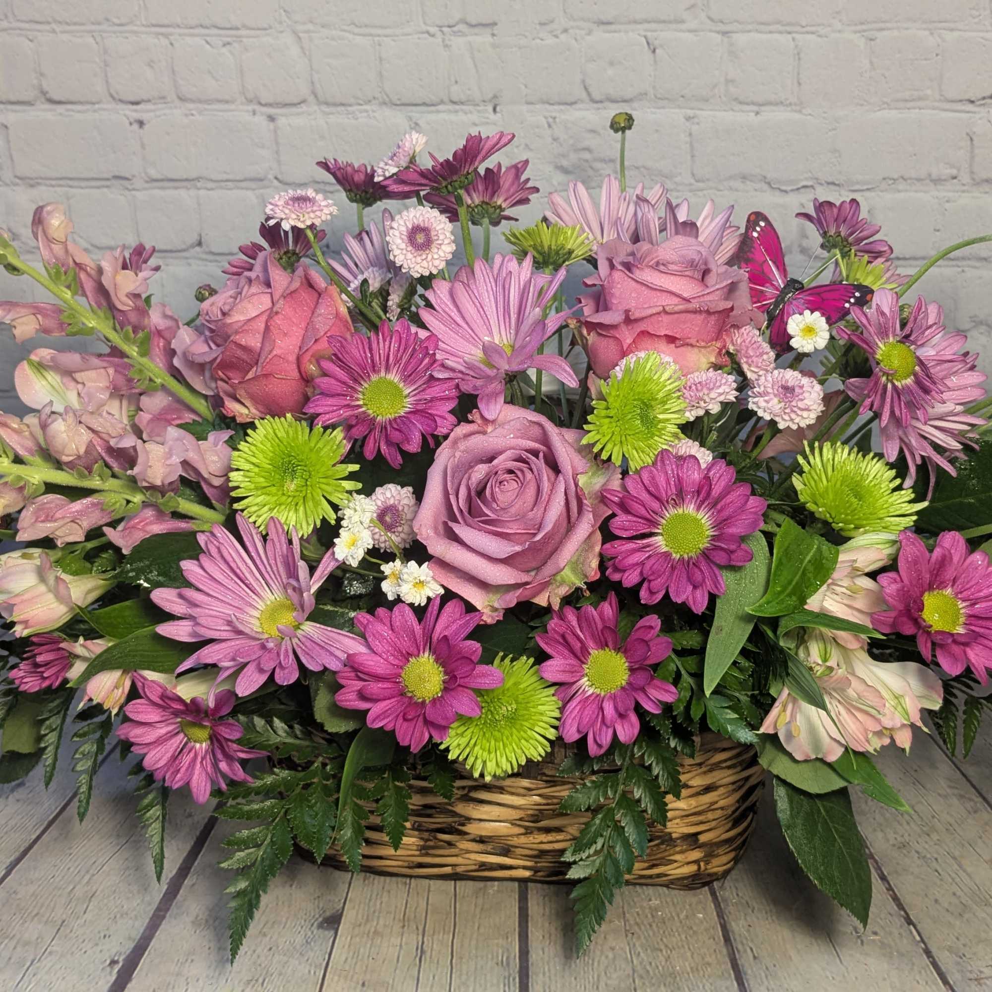 Soft, sweet, and full of country charm, the Country Butterfly Bouquet brings