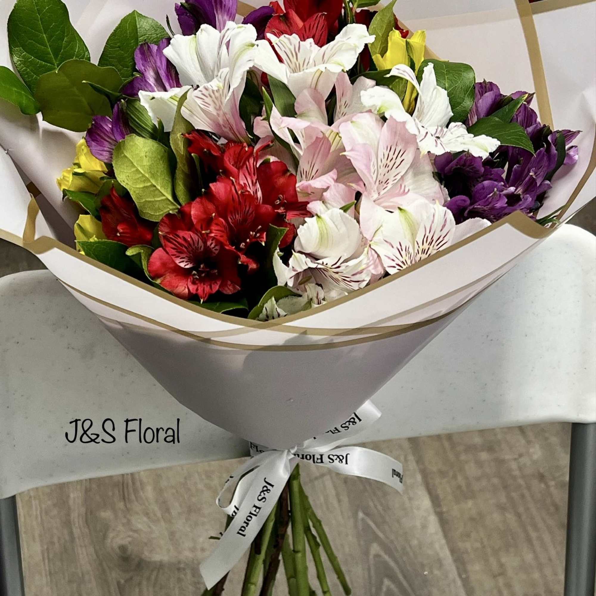 Introduction our alstroemerias lovers bouquet, beautifully arranged with greenery. 
Standard size has