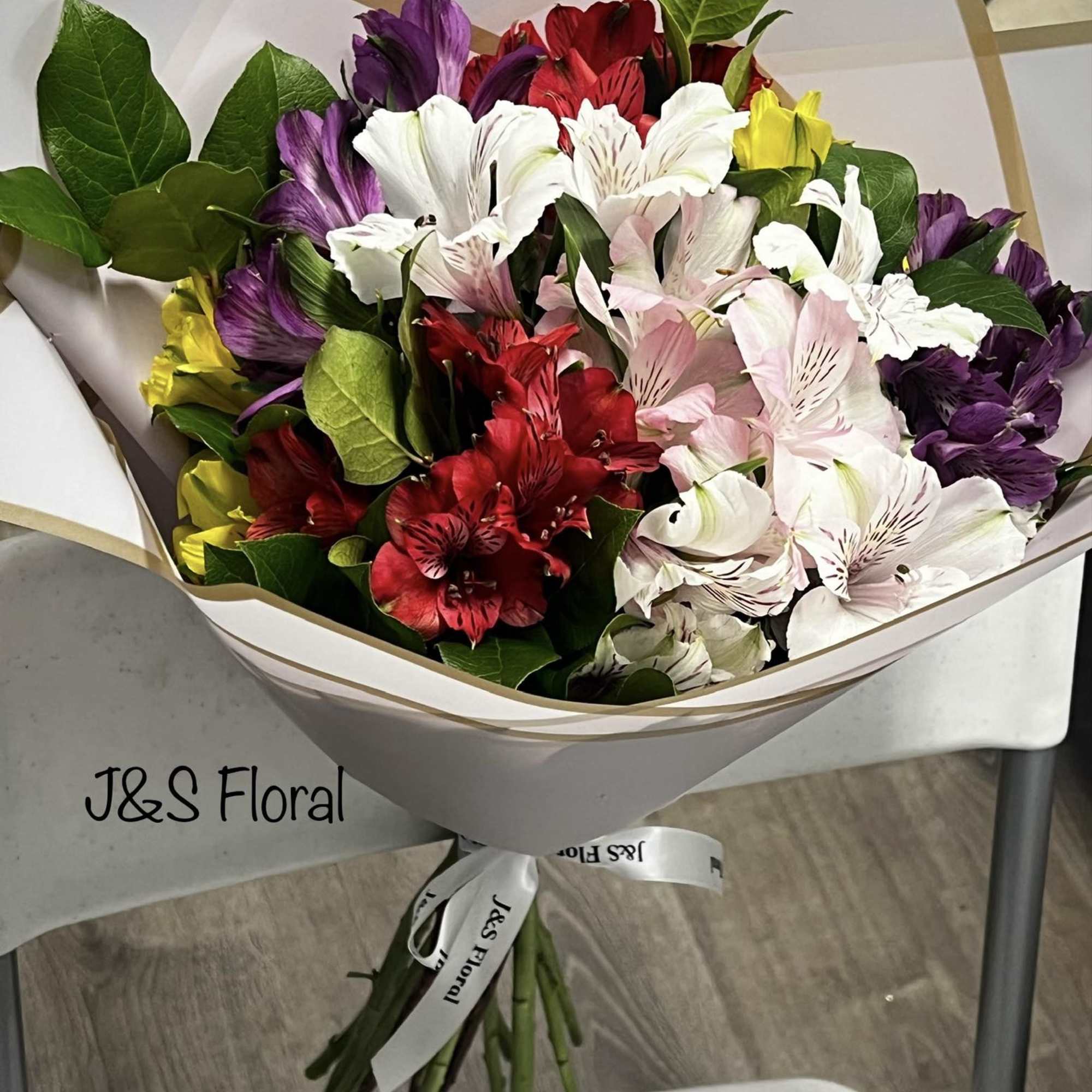 Introduction our alstroemerias lovers bouquet, beautifully arranged with greenery. 
Standard size has