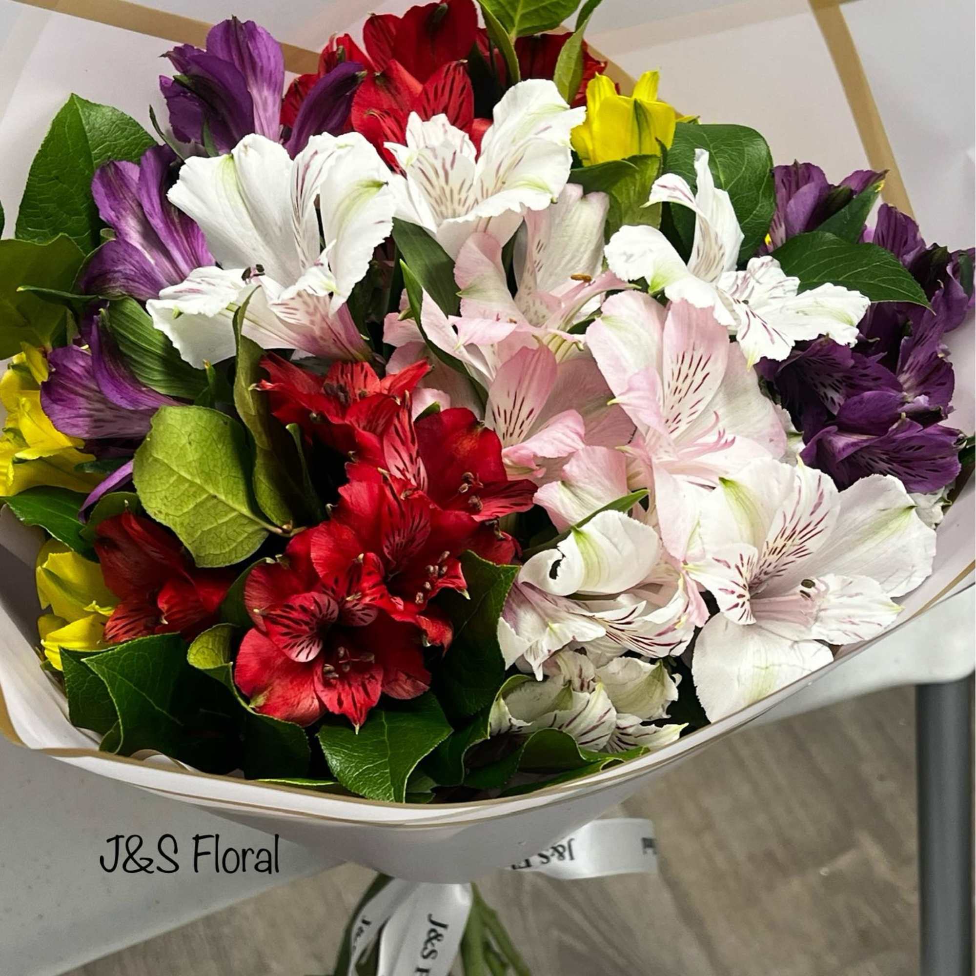 Introduction our alstroemerias lovers bouquet, beautifully arranged with greenery. 
Standard size has