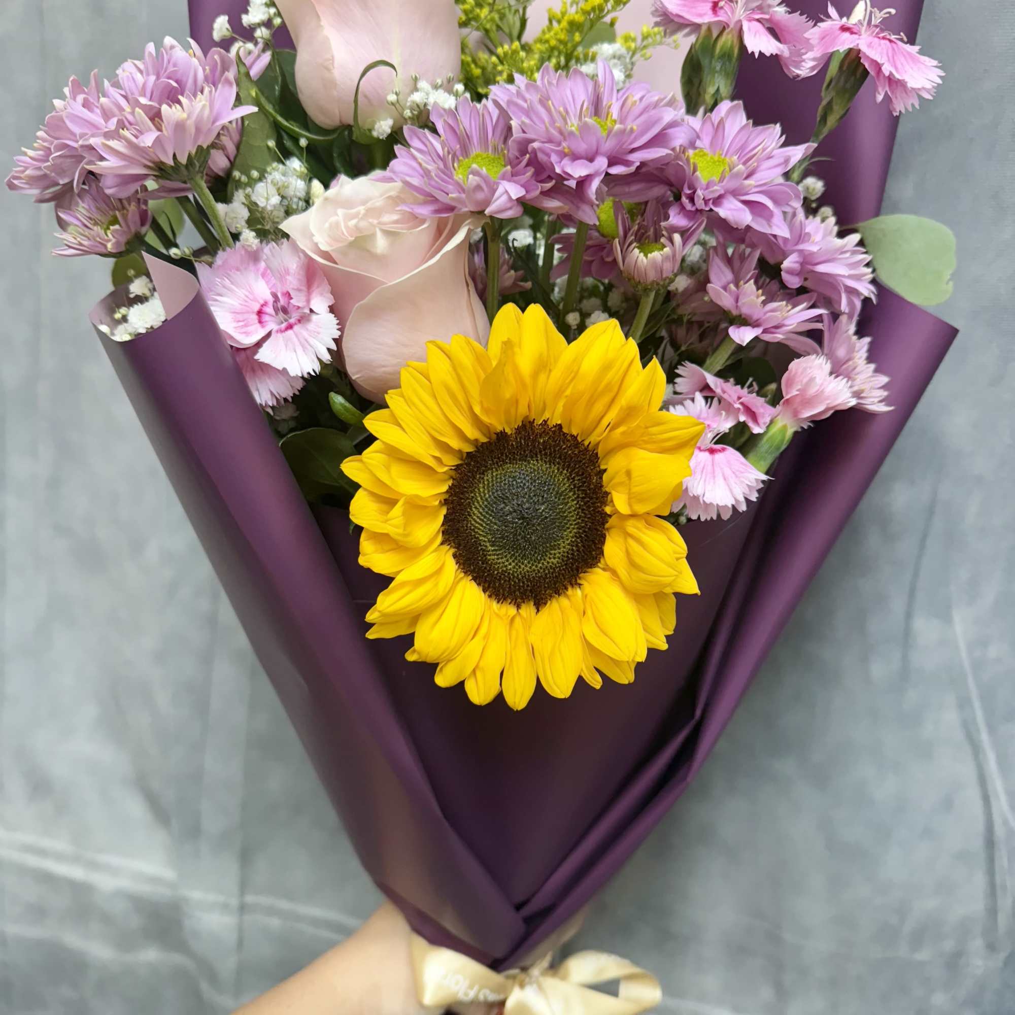 A delightful fusion of sunny vibrancy and lavender tones with pink toned