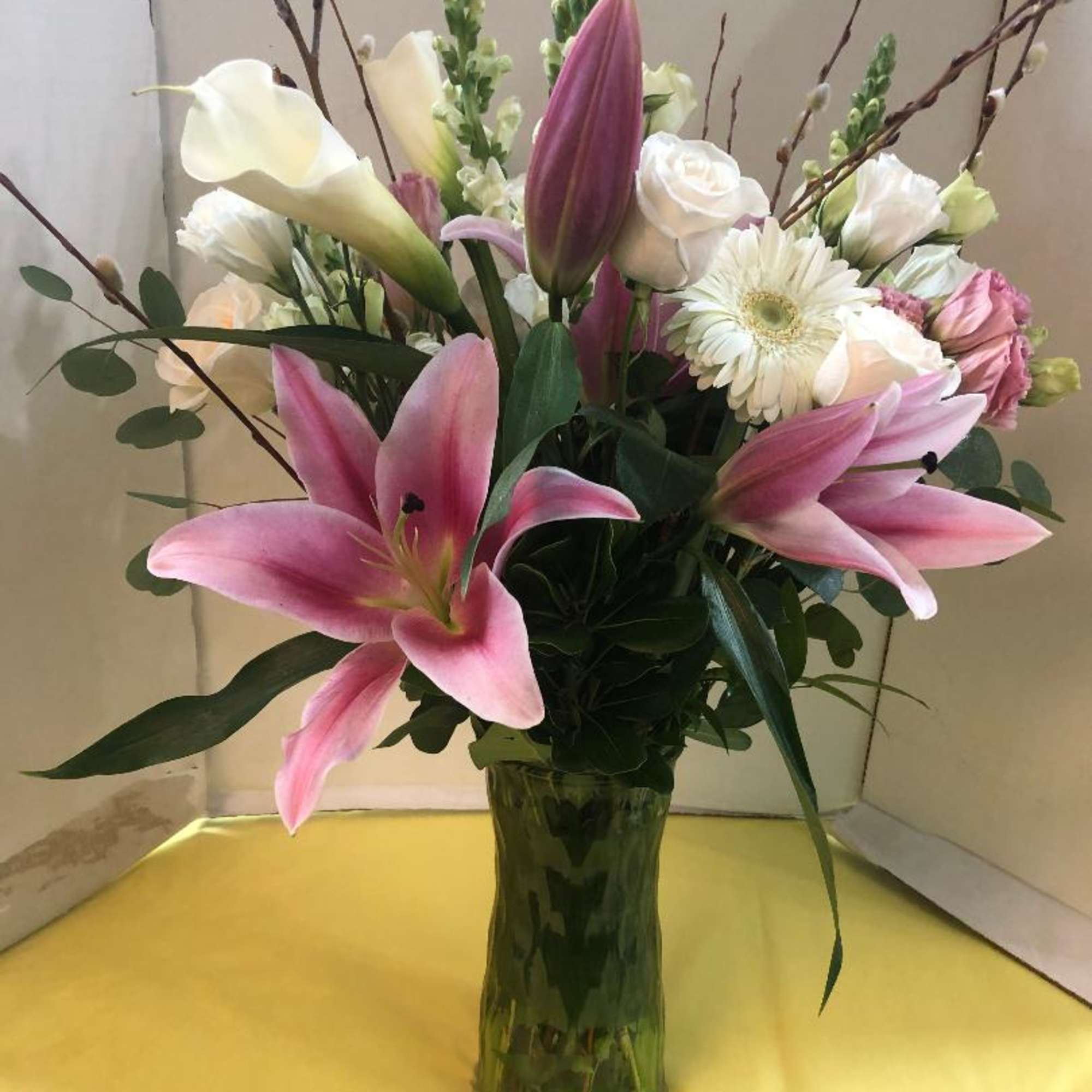 Lilies, Roses, Gerbera Daisies, Lisianthus, Stock, Fancy Greens 