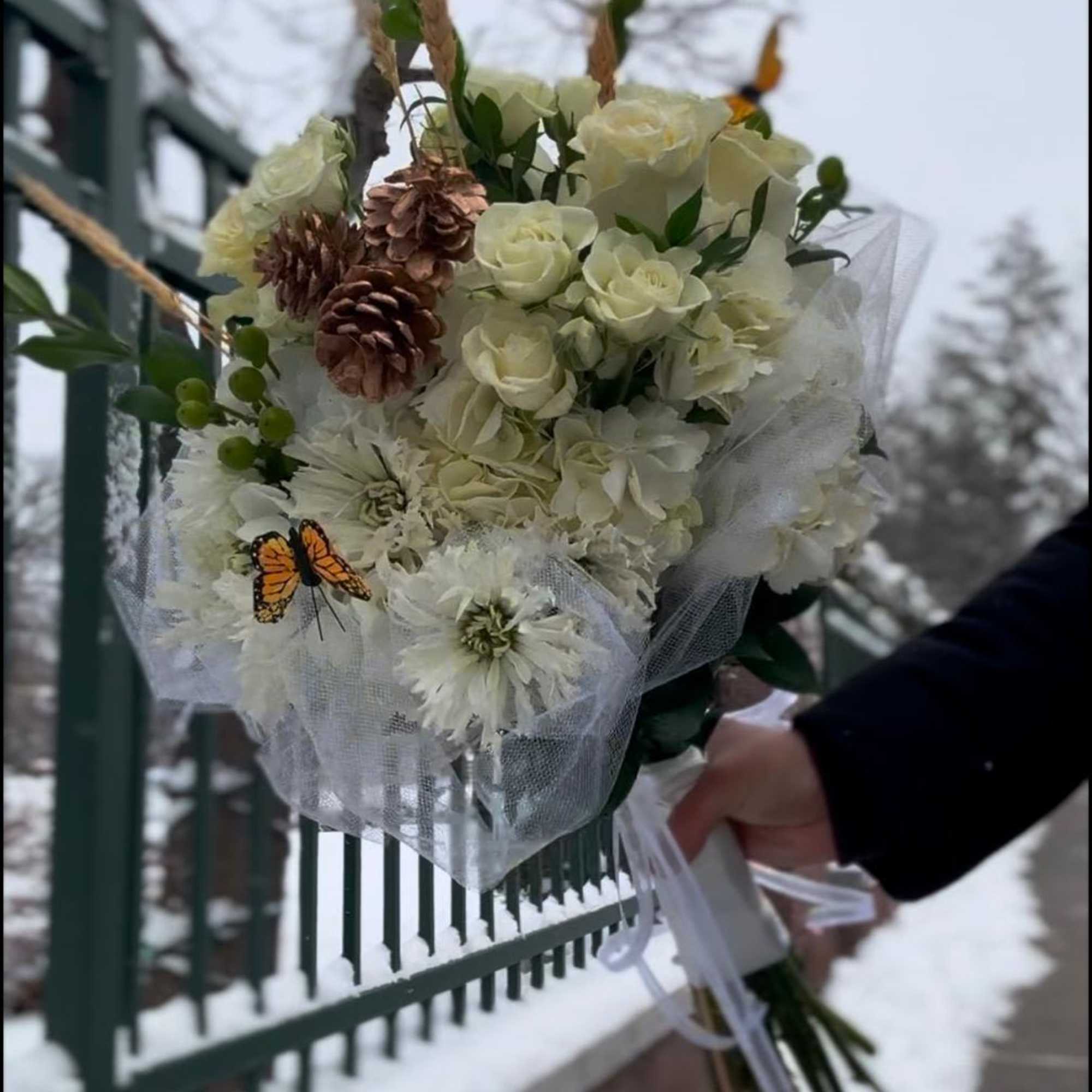 Our Winter Bouquet is a beautiful seasonal arrangement inspired by the elegance