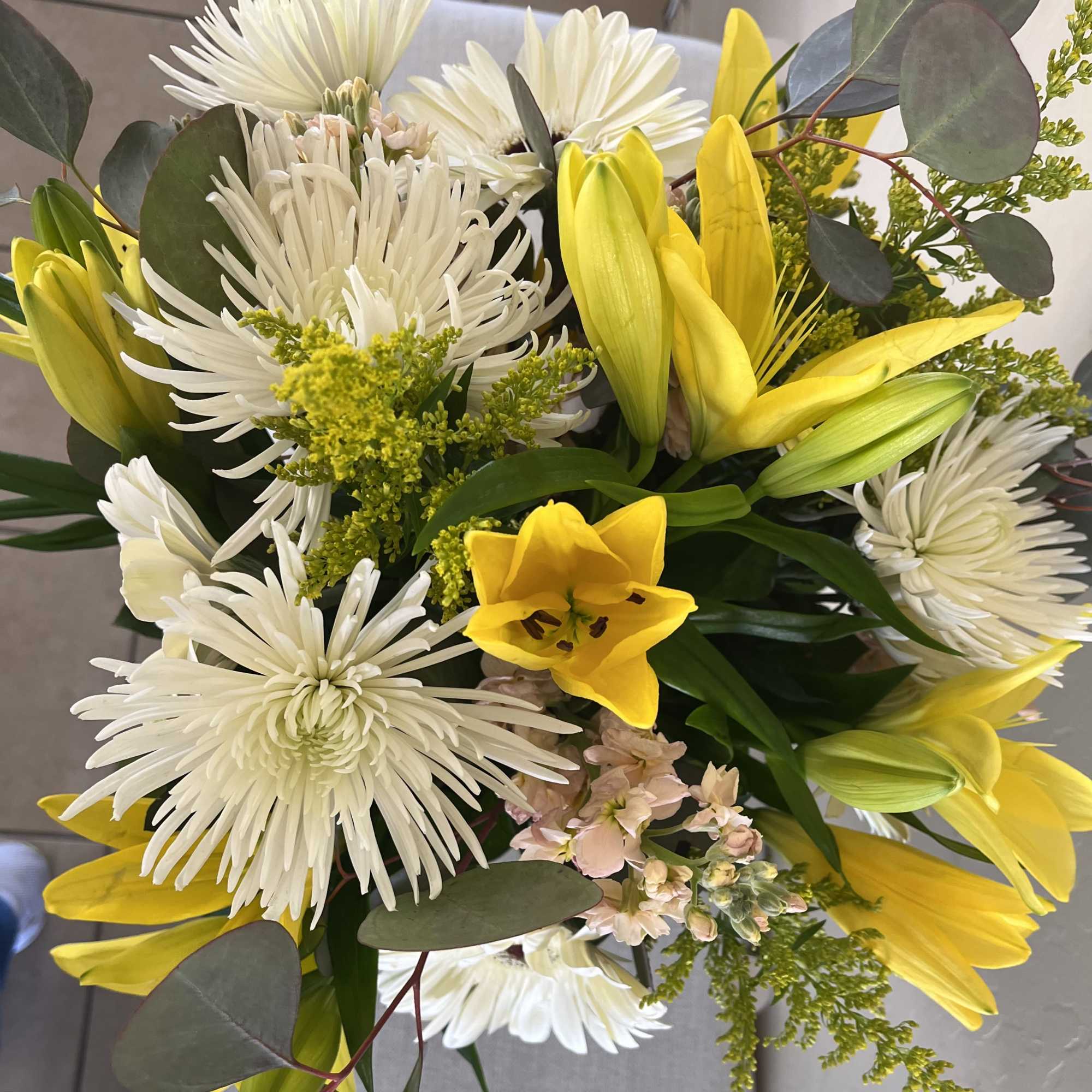 Send some shine and warmth with this vibrant bouquet that resembles a