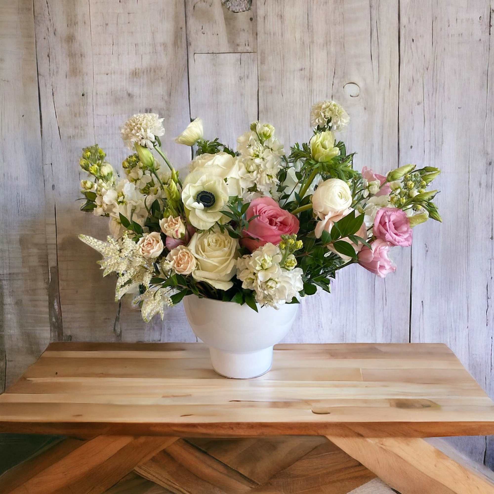 Designed and hand-crafted with a variety of seasonal, fresh, high-end flowers. Pictures