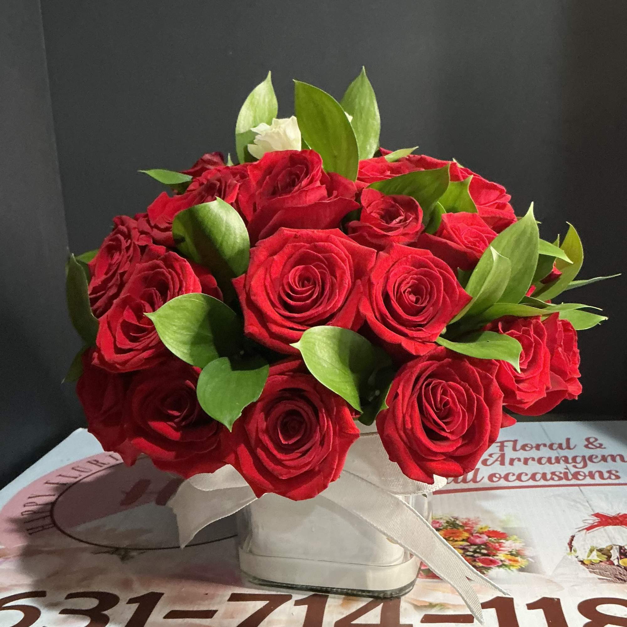 35 short red roses with one white heart reactive for any occasion