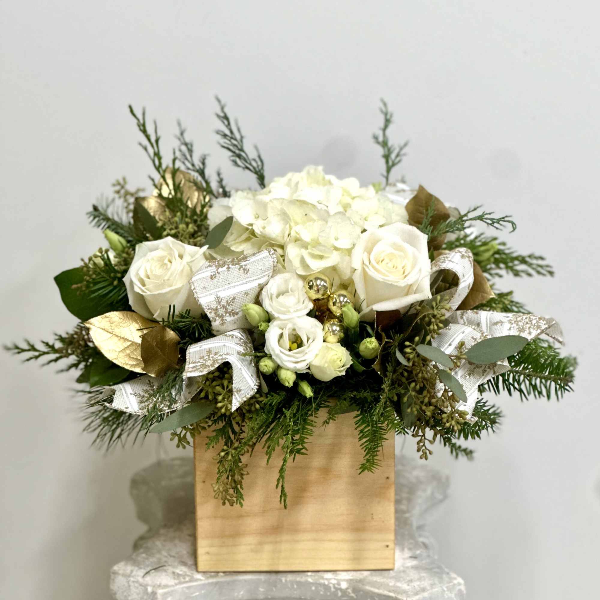 Elevate your dining experience with White Christmas by Westford Florist Art by