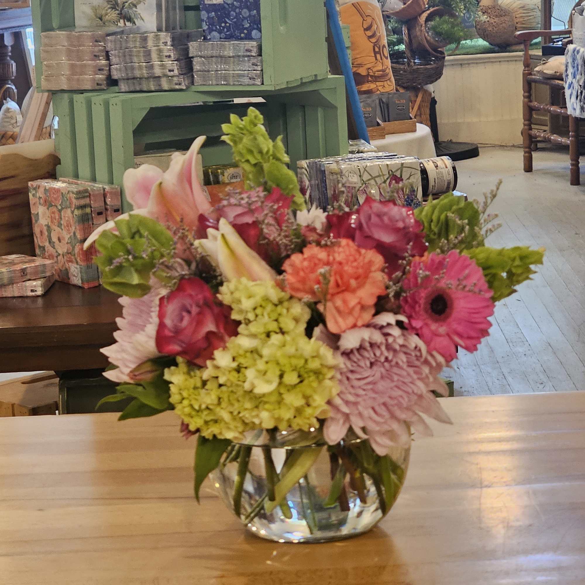 A bowl full of seasonal flowers!! Sure to delight anyone!  A