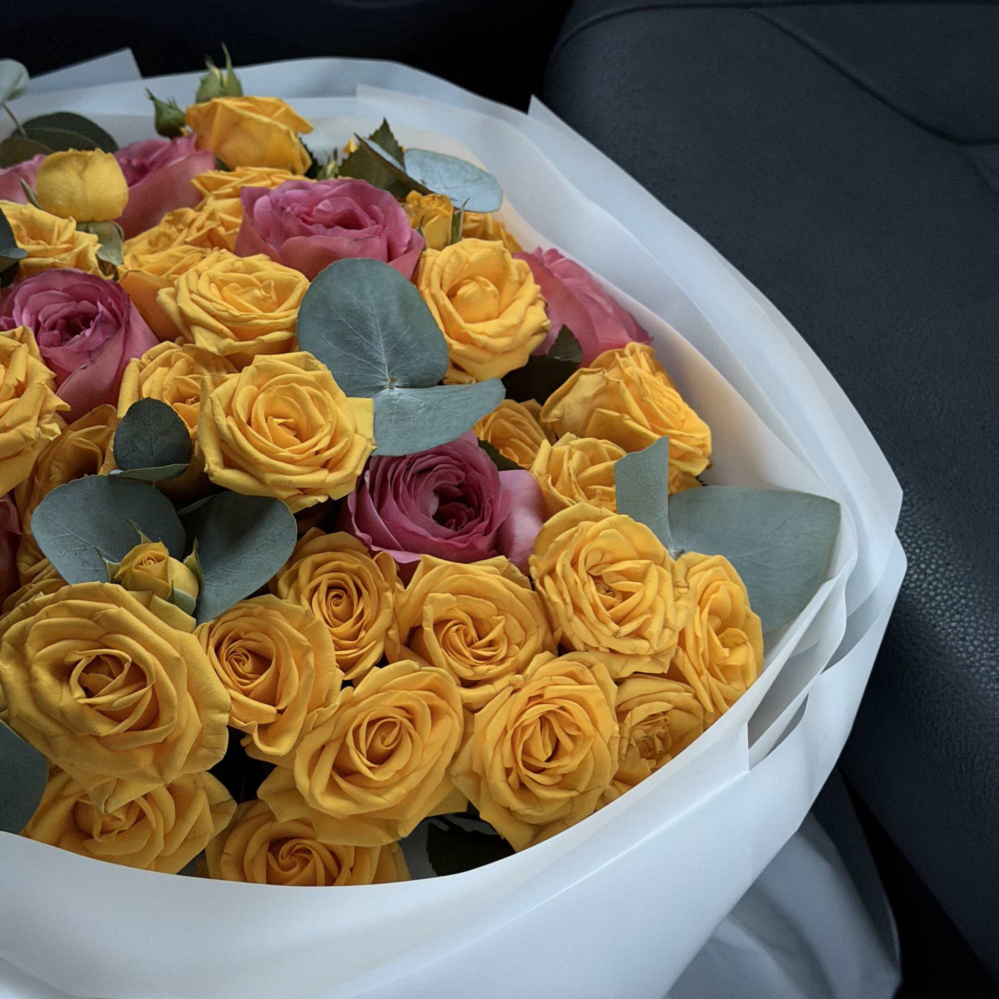 This luxurious bouquet is a stunning blend of vibrant golden roses paired
