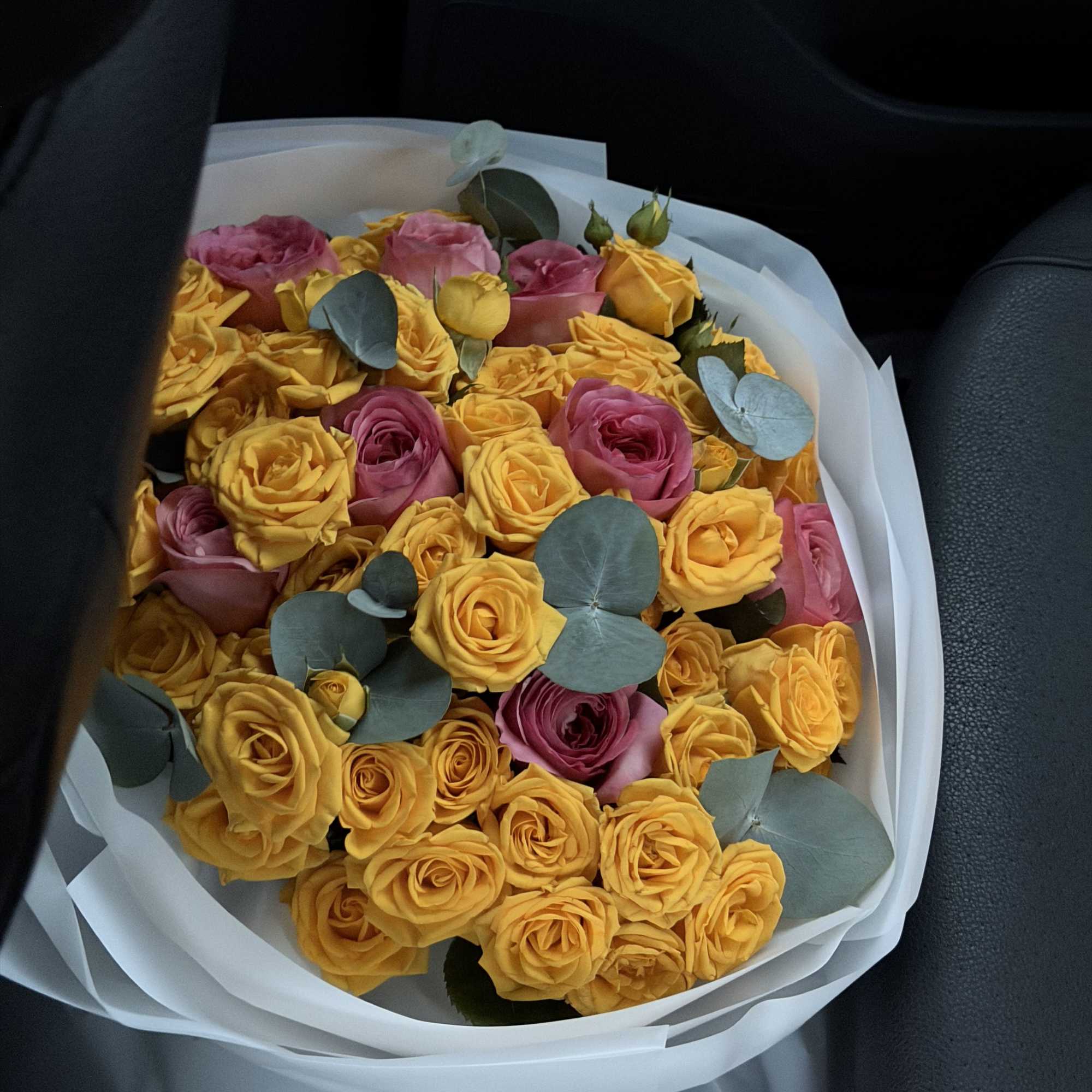 This luxurious bouquet is a stunning blend of vibrant golden roses paired