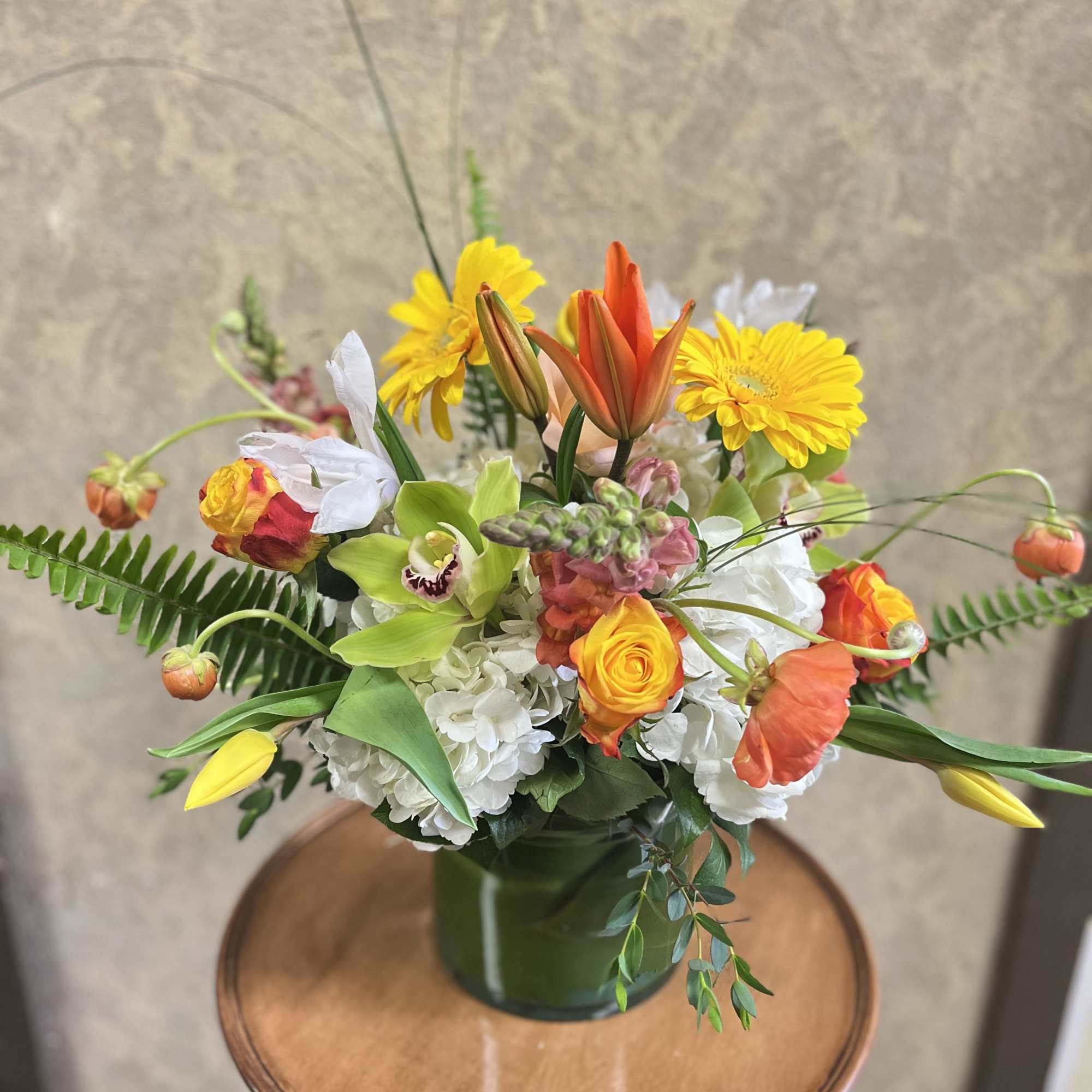 This bright design is cheerful and fun with seasonal flowers popping out