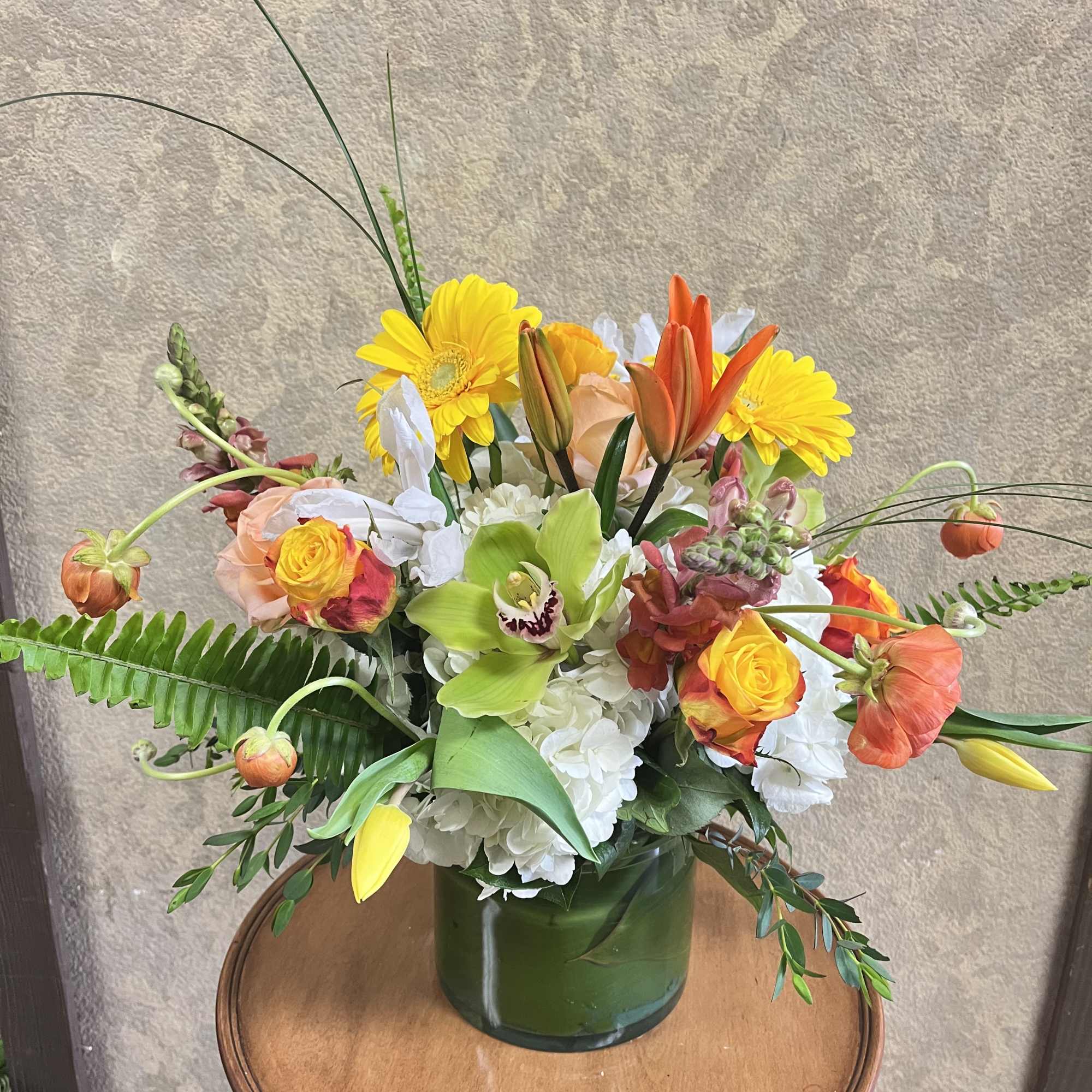 This bright design is cheerful and fun with seasonal flowers popping out