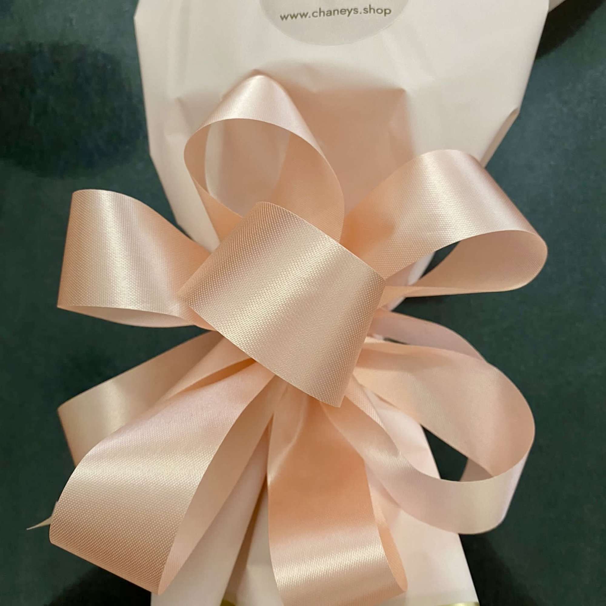 20 pink rose design wrapped with baby pink colored wrap paper. Hand