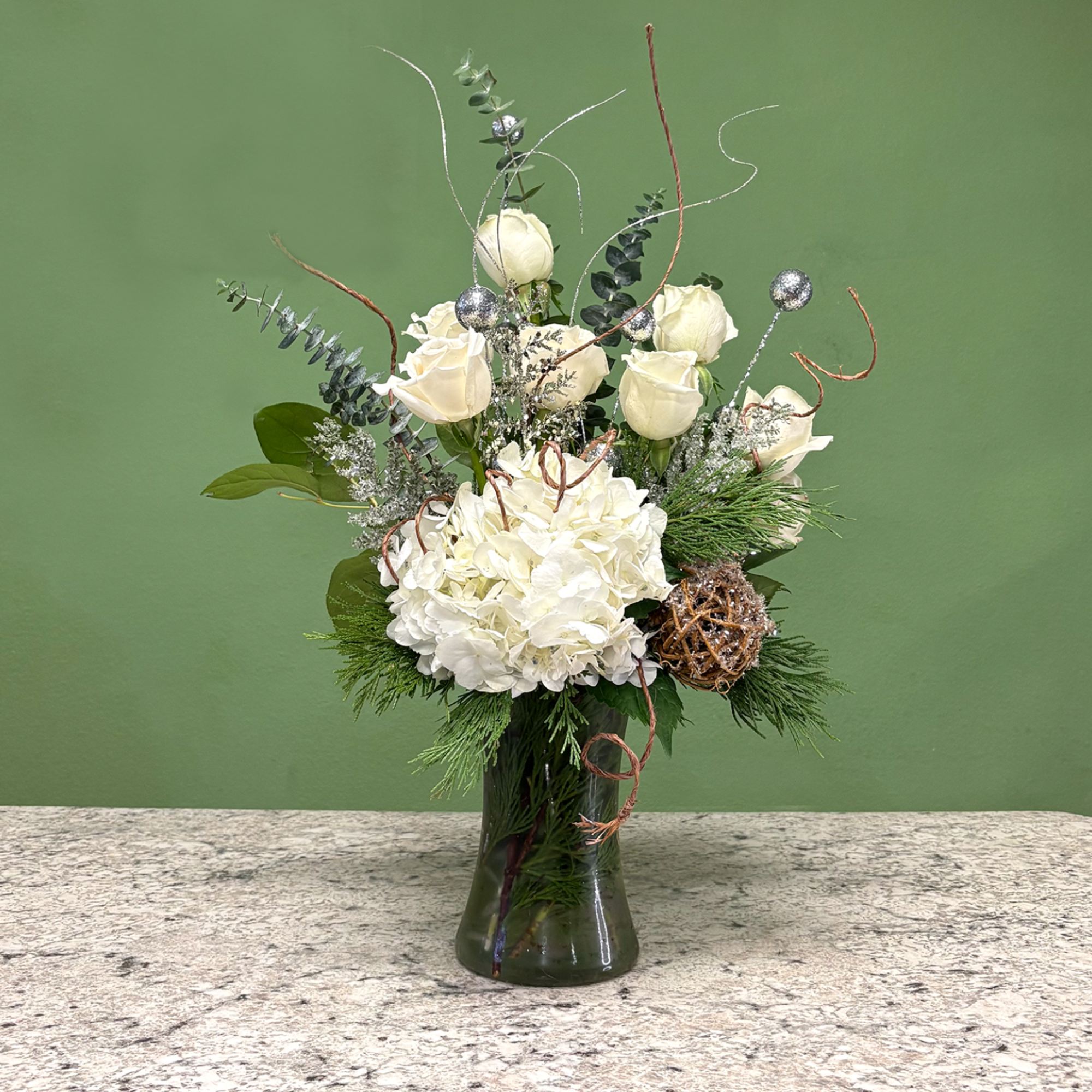 A mixed arrangement that celebrates the new year, showcasing a white and