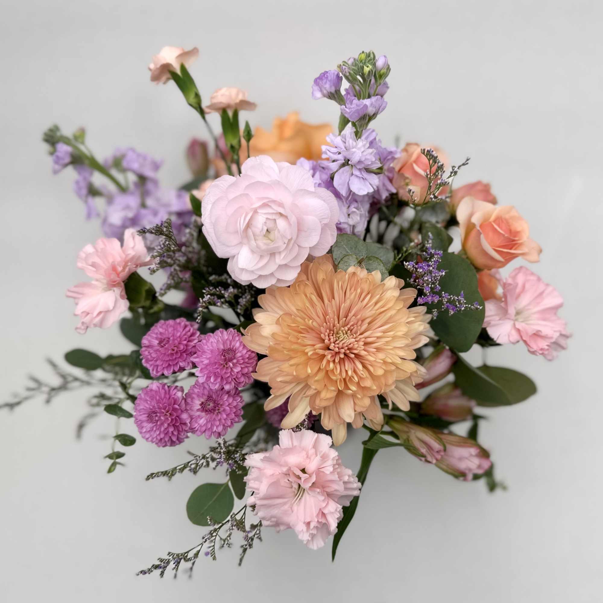 Delightfully enchanting is our Fairy Castle arrangement! Soft pink, peach and purple