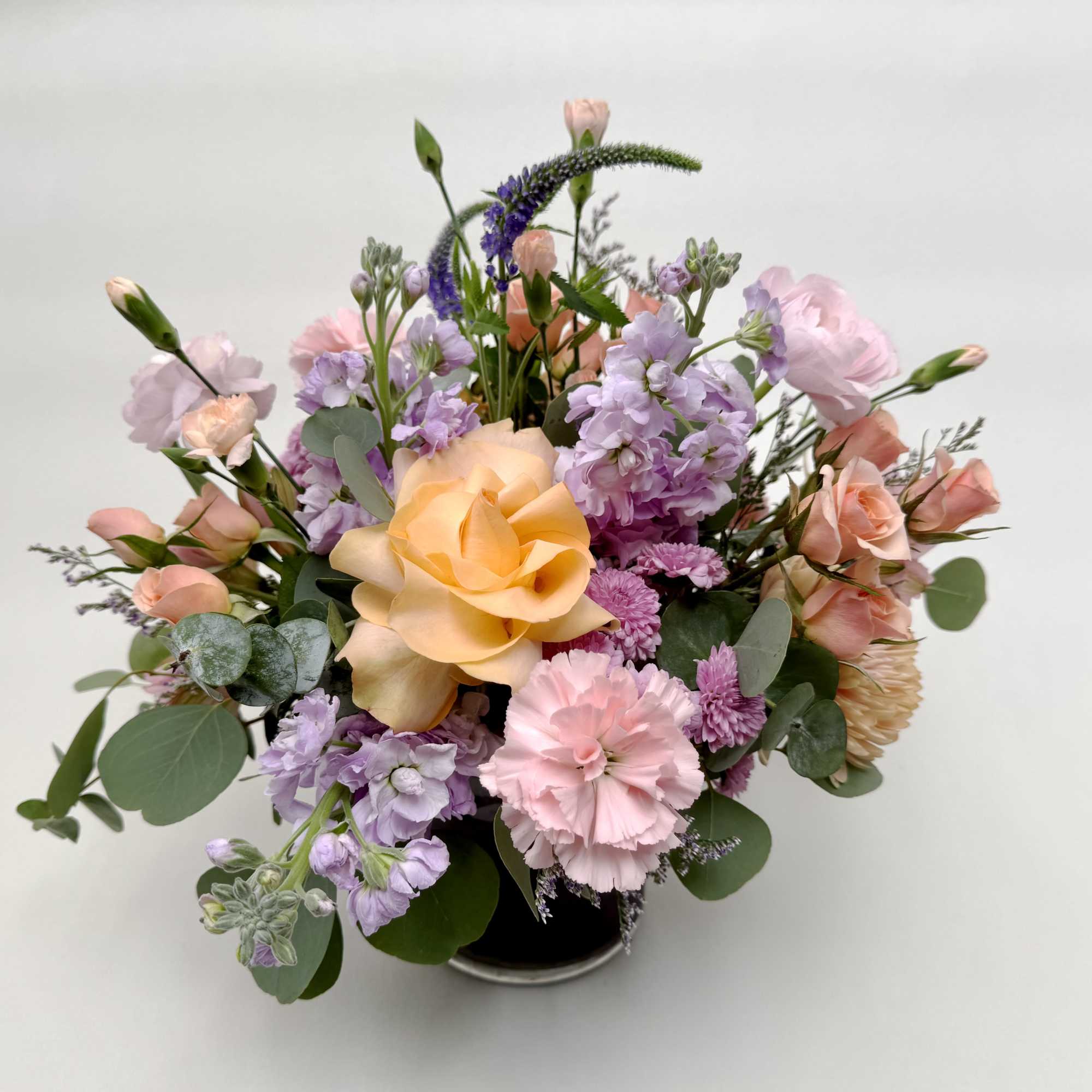 Delightfully enchanting is our Fairy Castle arrangement! Soft pink, peach and purple