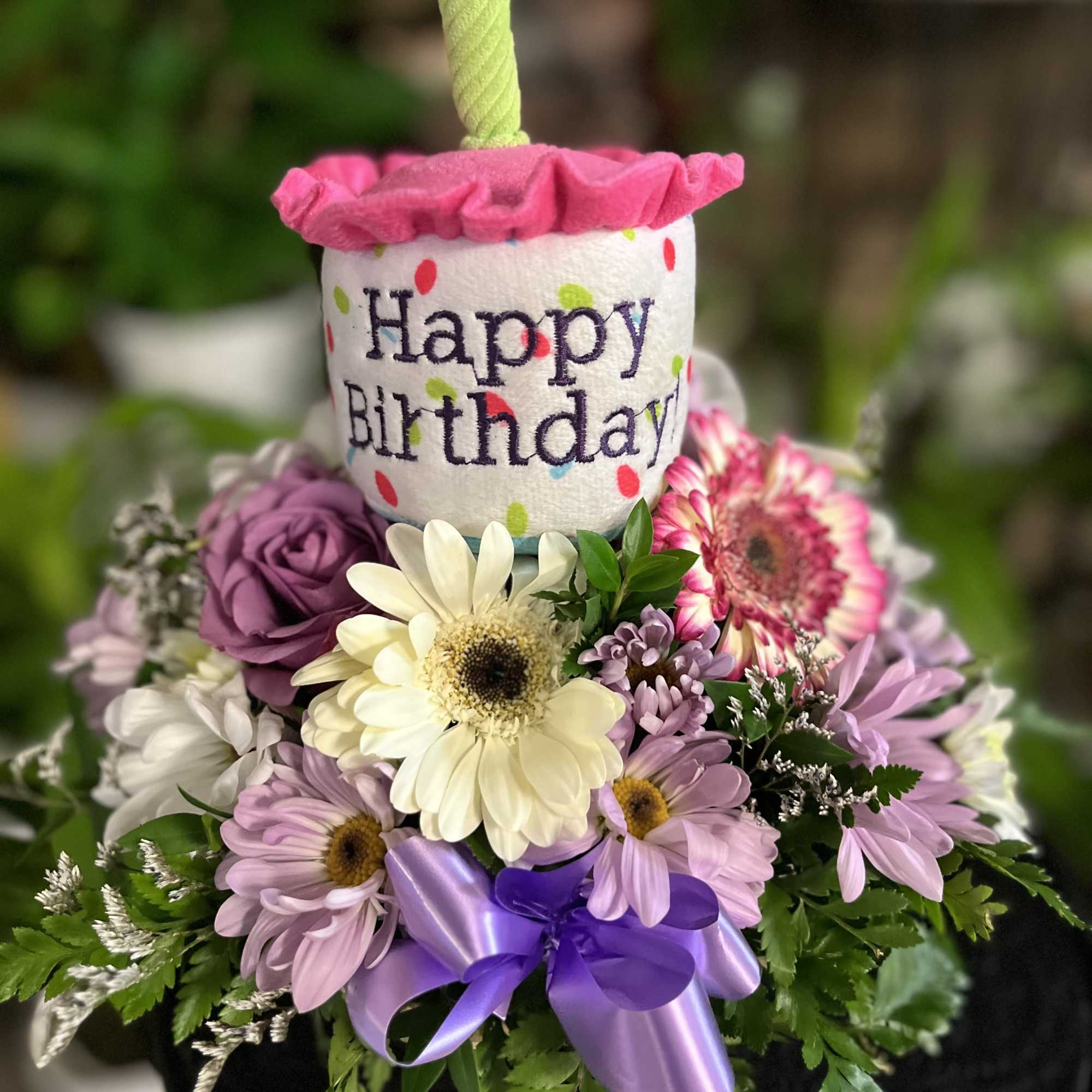 fresh flowers in basket with happy b day plush 