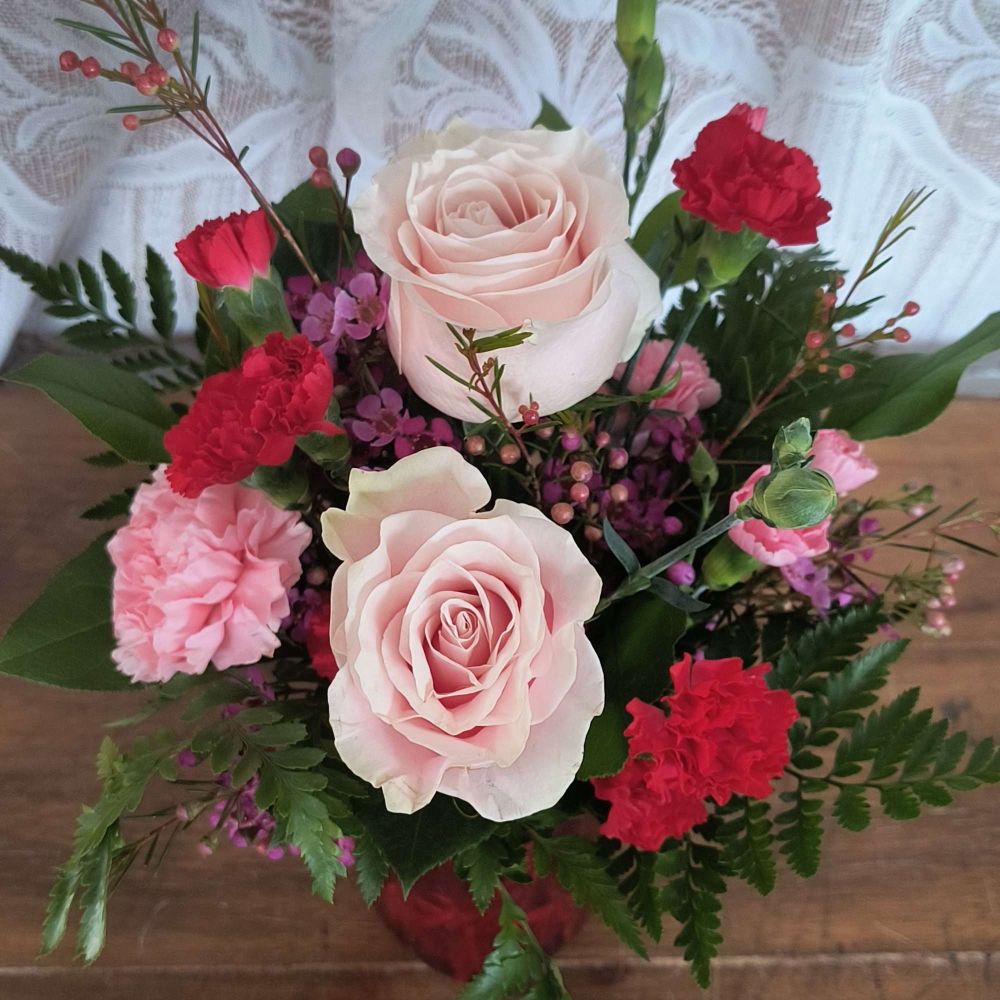 Perfect for Valentine's, Anniversary or I'm sorry. Pink and red carnations with