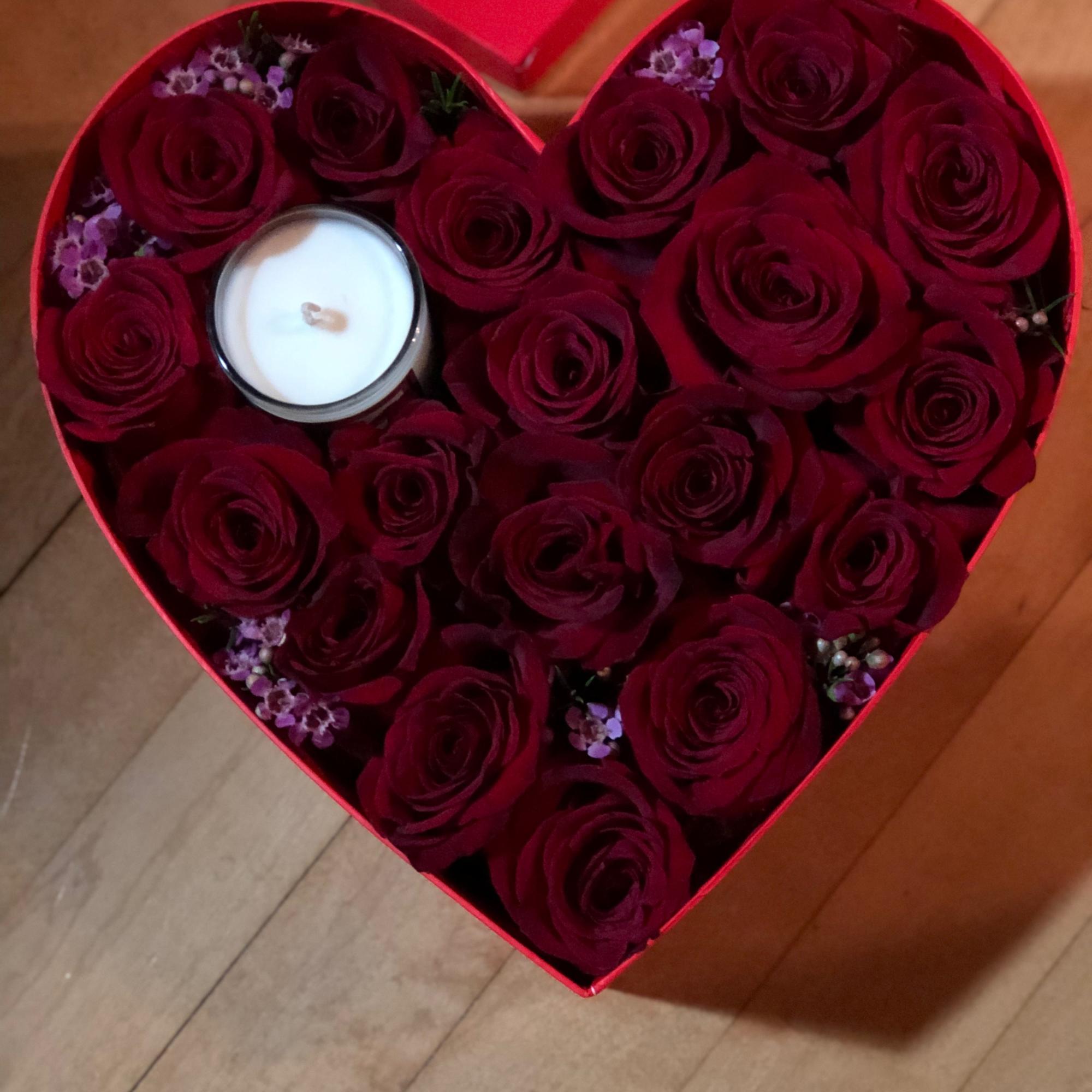 A beautiful heart box filled with roses, accented with a scented soy