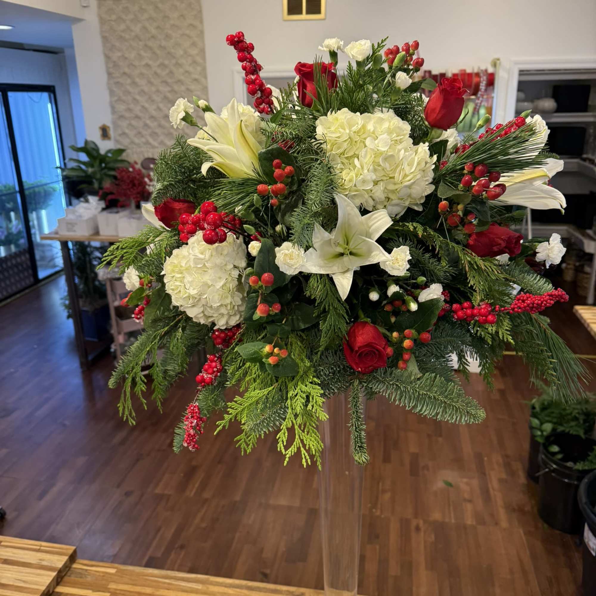 A beautifully balanced centerpiece designed to enhance the table while allowing conversation