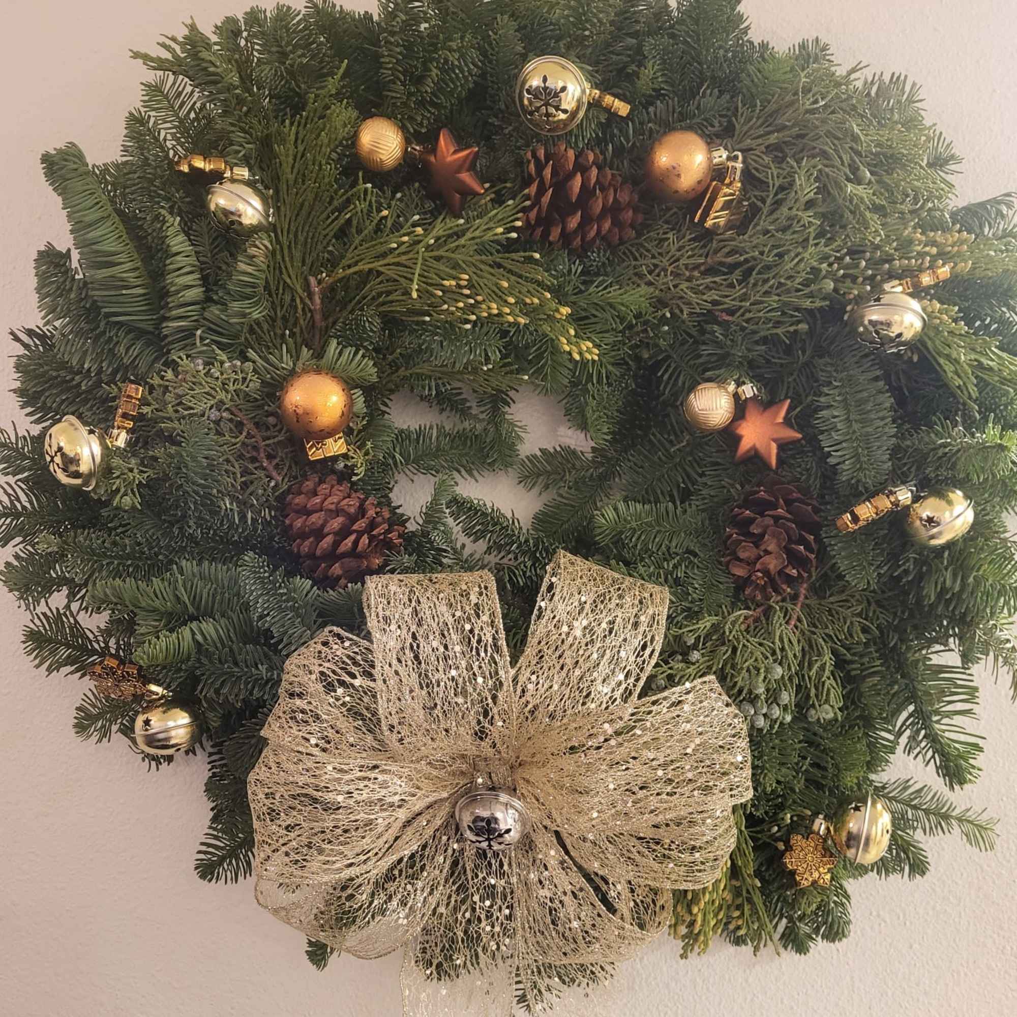 A festive wreath to hang on your door, wall or where ever