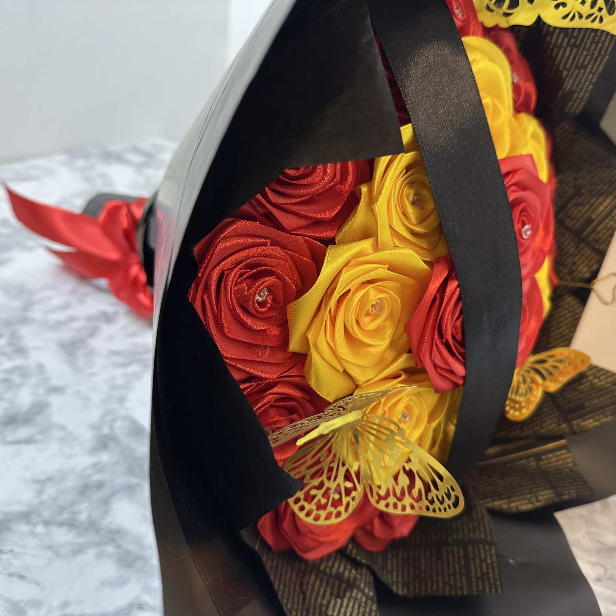 everlasting bouquets with red and yellow roses