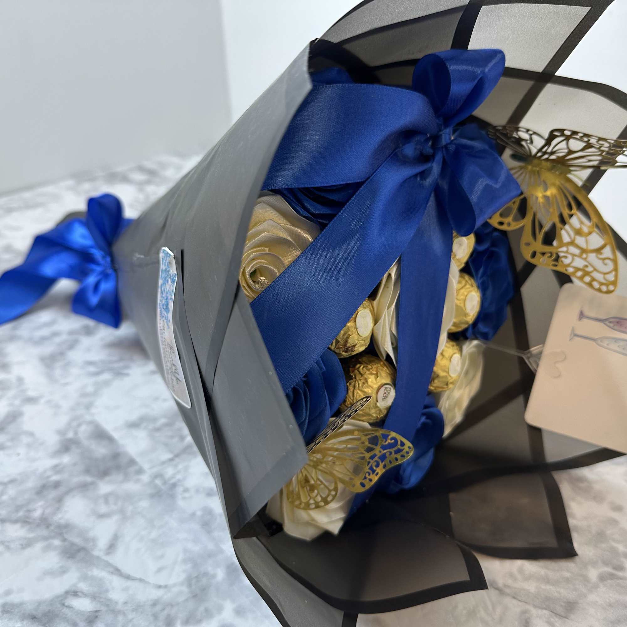 Bouquet of eternal roses, royal blue and beige, 6 Ferrero Rocher chocolates