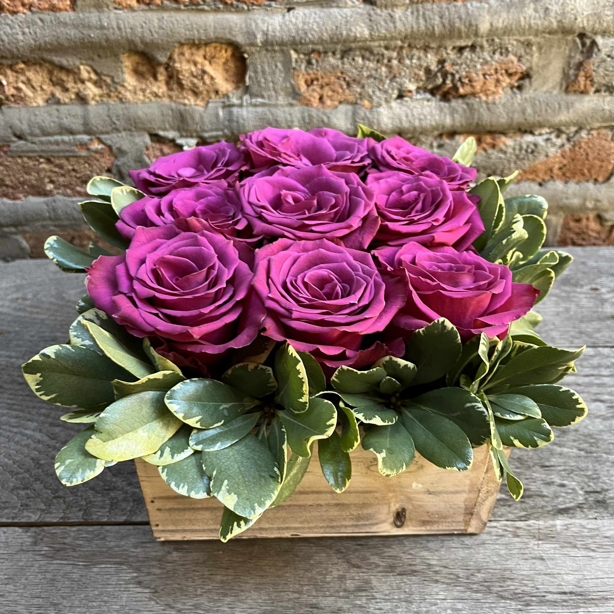 Trendy Box of Designer Big Head Roses available with greens in a