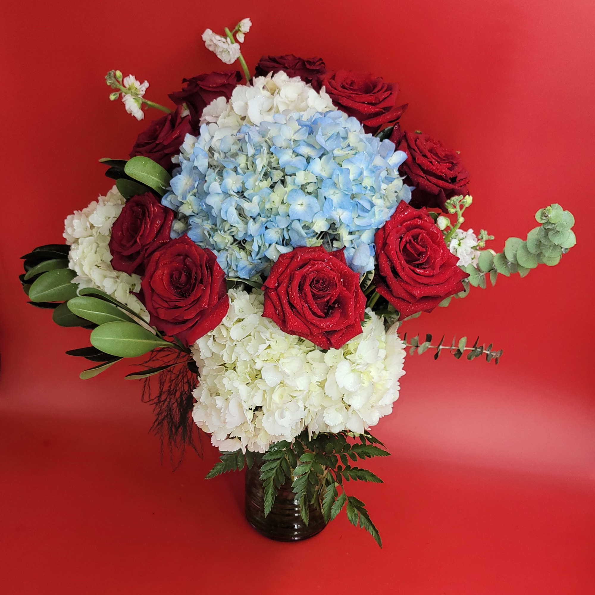 She is different! 
Hydrangeas and roses