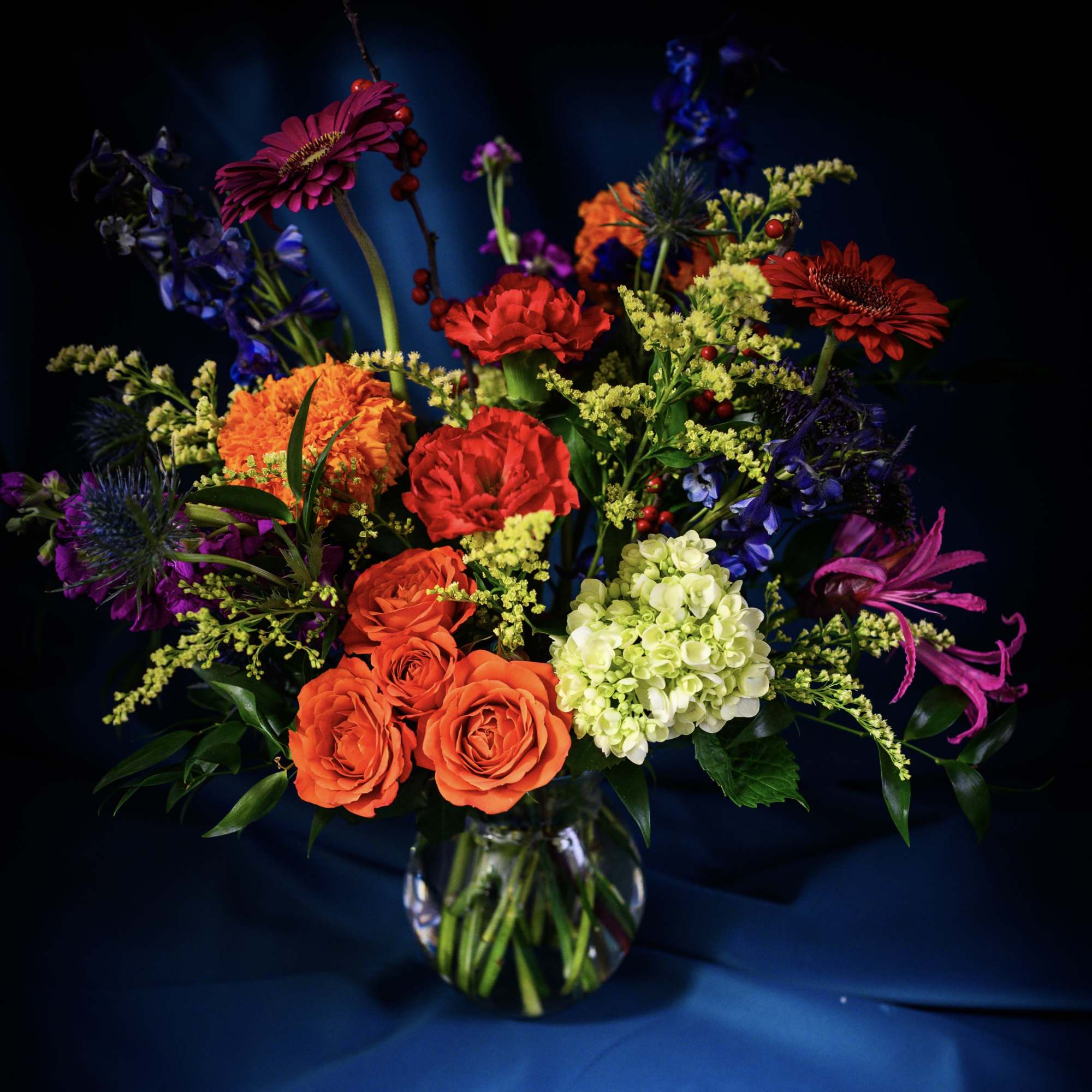 This bold and bright bouquet of lush flowers is reminiscent of a