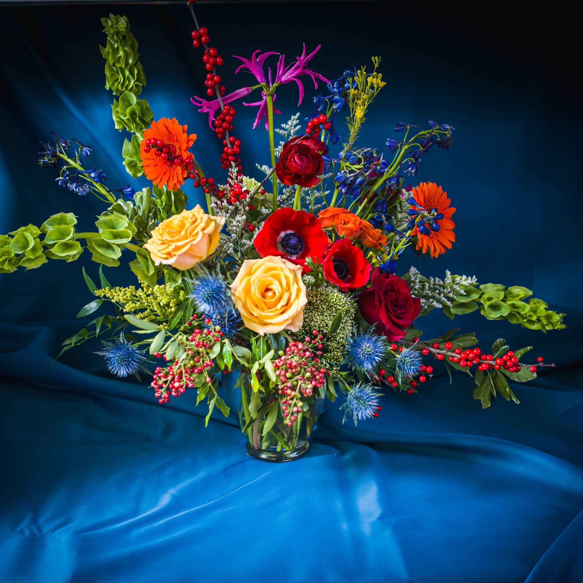 This bold and bright bouquet of lush flowers is reminiscent of a