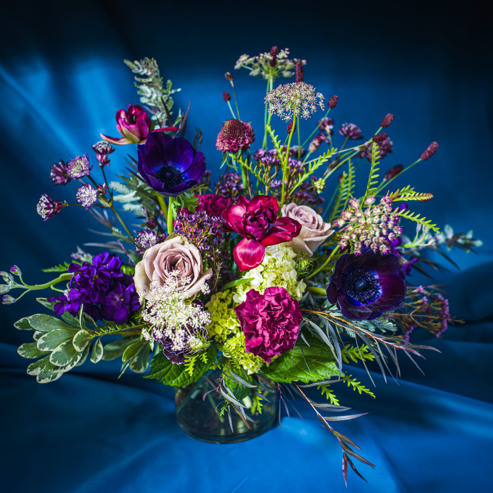 A delectable collection of rich plums, deep burgundies, textural greens and tinted