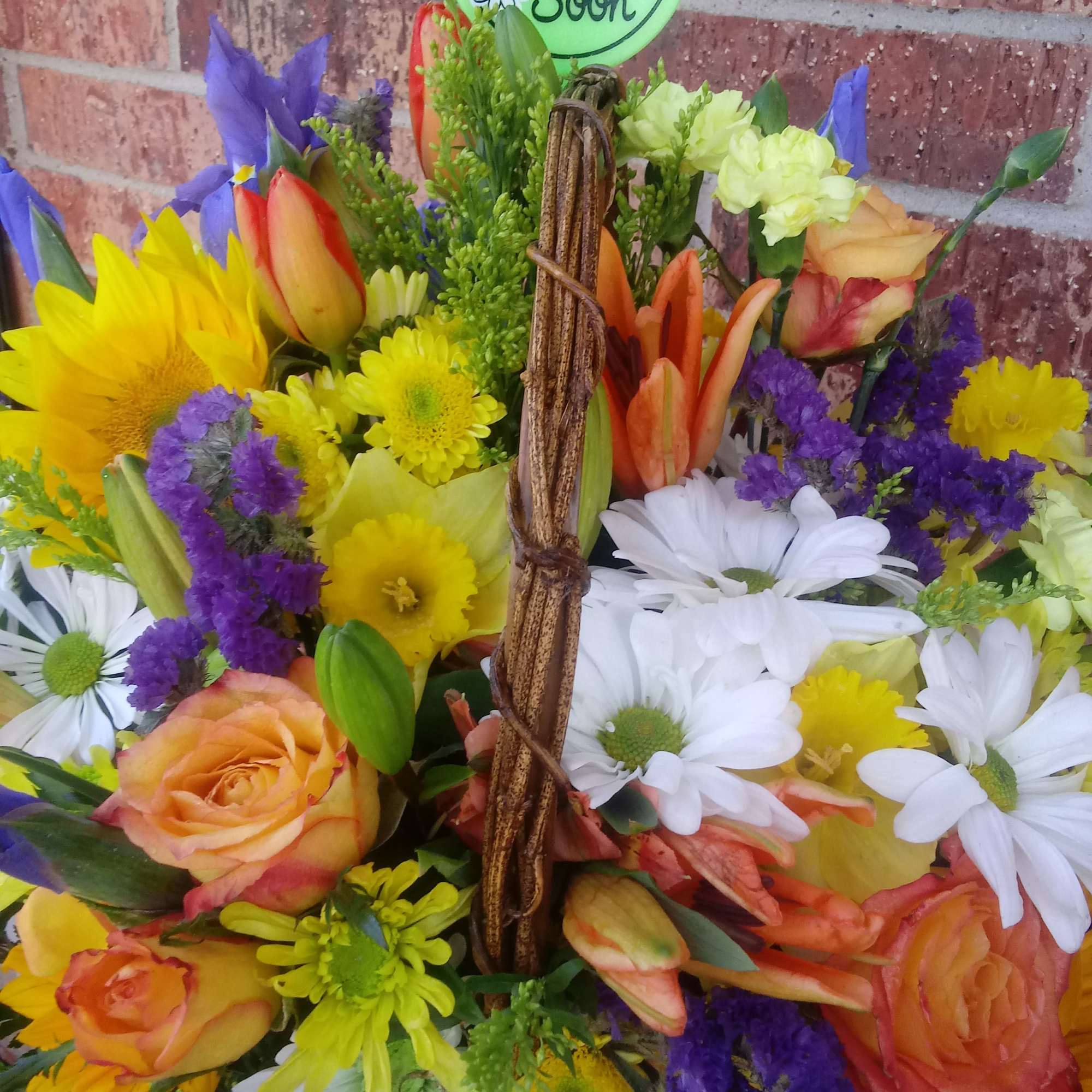 A beautiful bright colorful mixture of daisies, lilies, tulips and many more