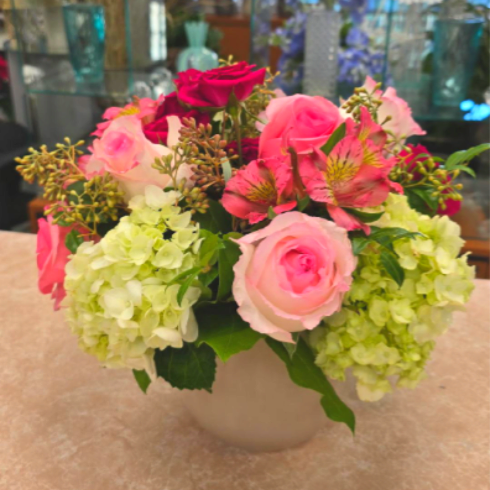 SHADES OF PINK ARRANGEMENT IN CERAMIC CONTAINER BY TWIN TOWERS FLORIST