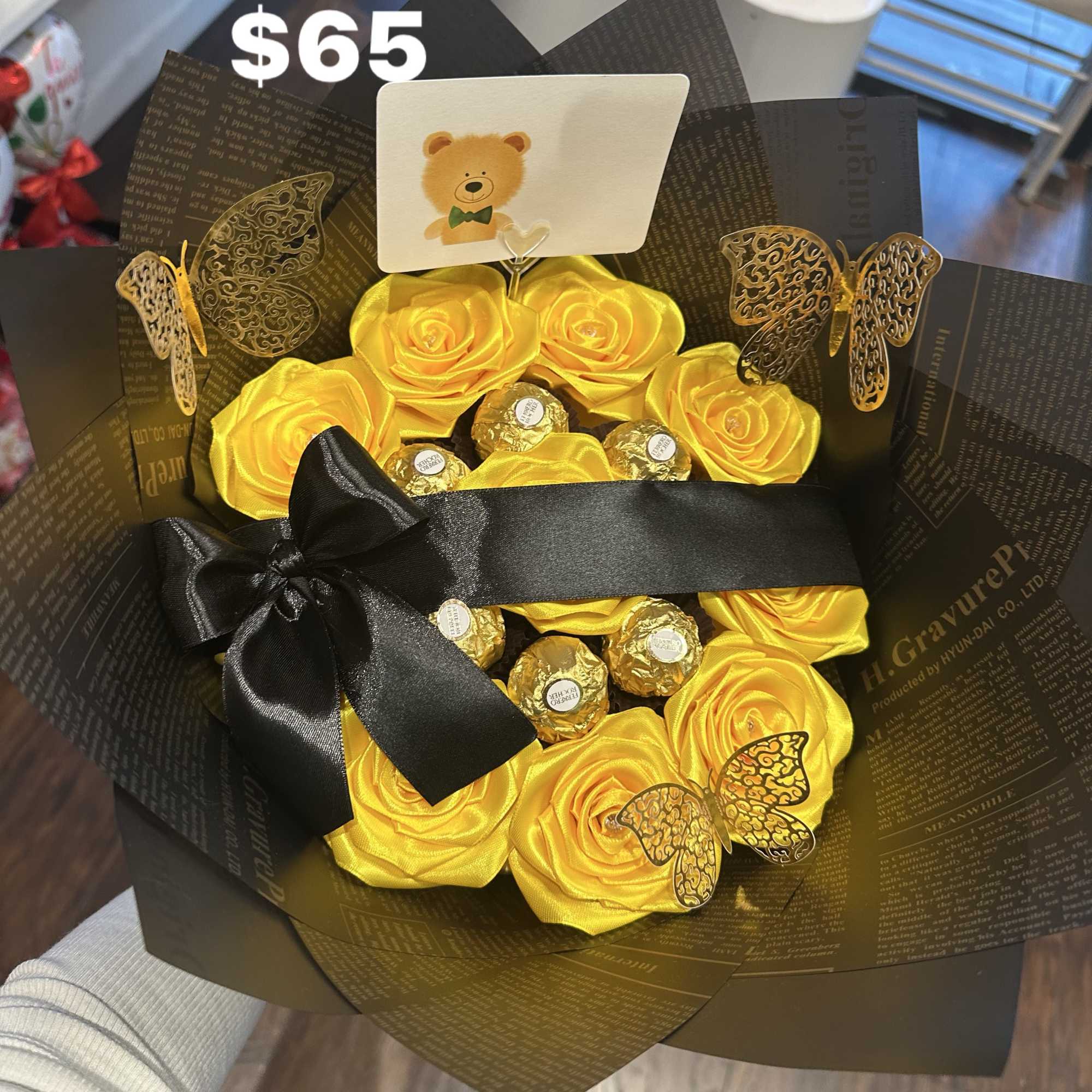Eternal yellow roses with 6 Ferrero chocolates and black wrapping