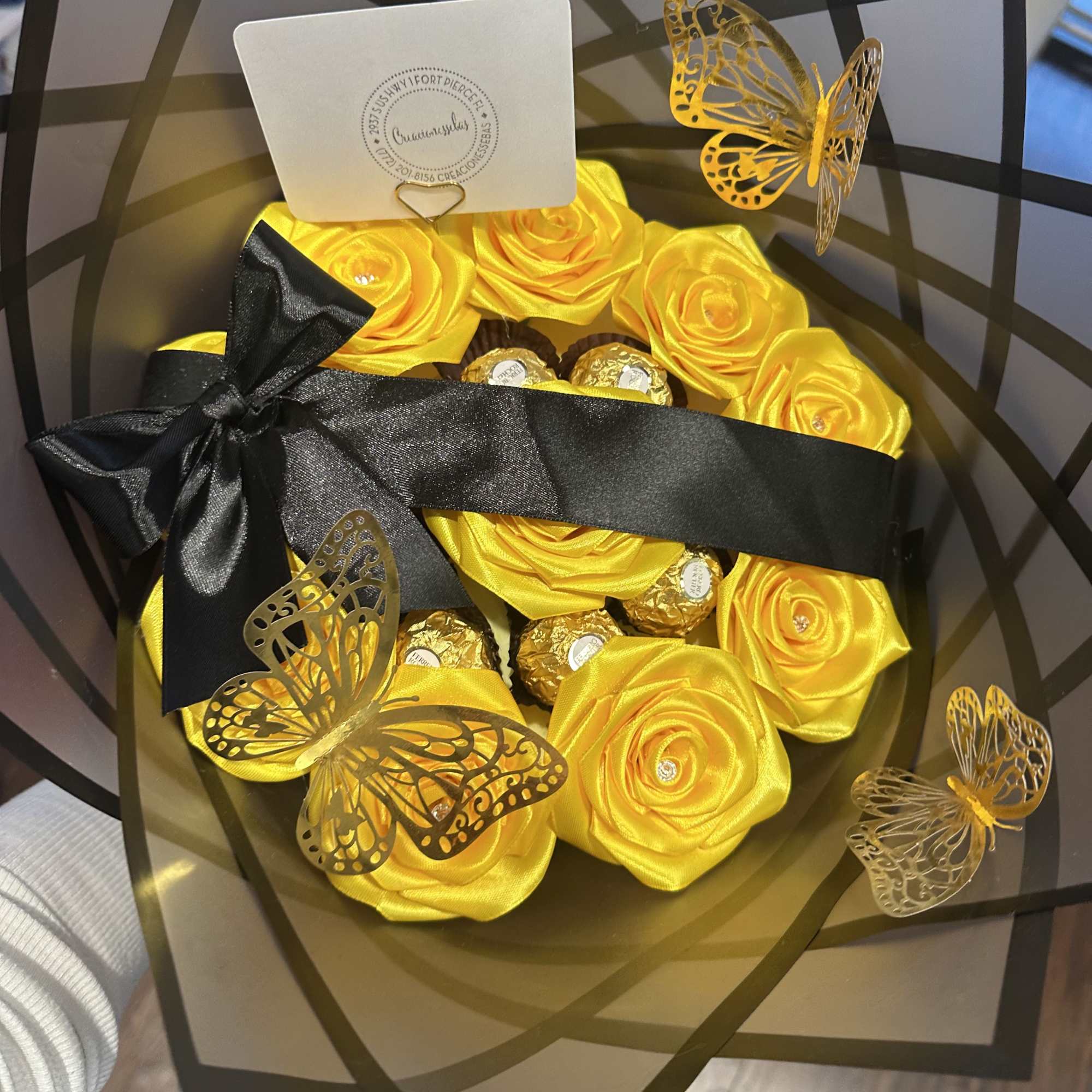 Eternal yellow roses with 6 Ferrero chocolates and black wrapping