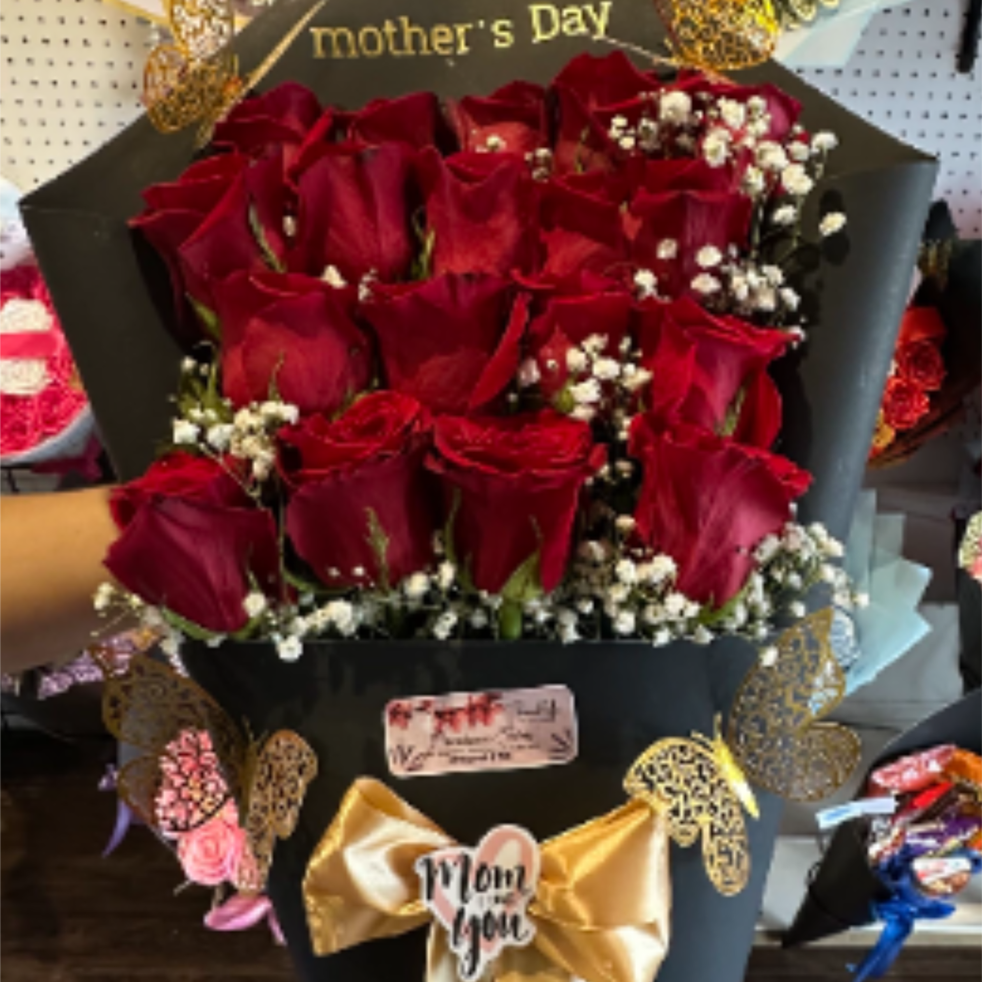 Elegant bouquet of 20 red roses wrapped in black