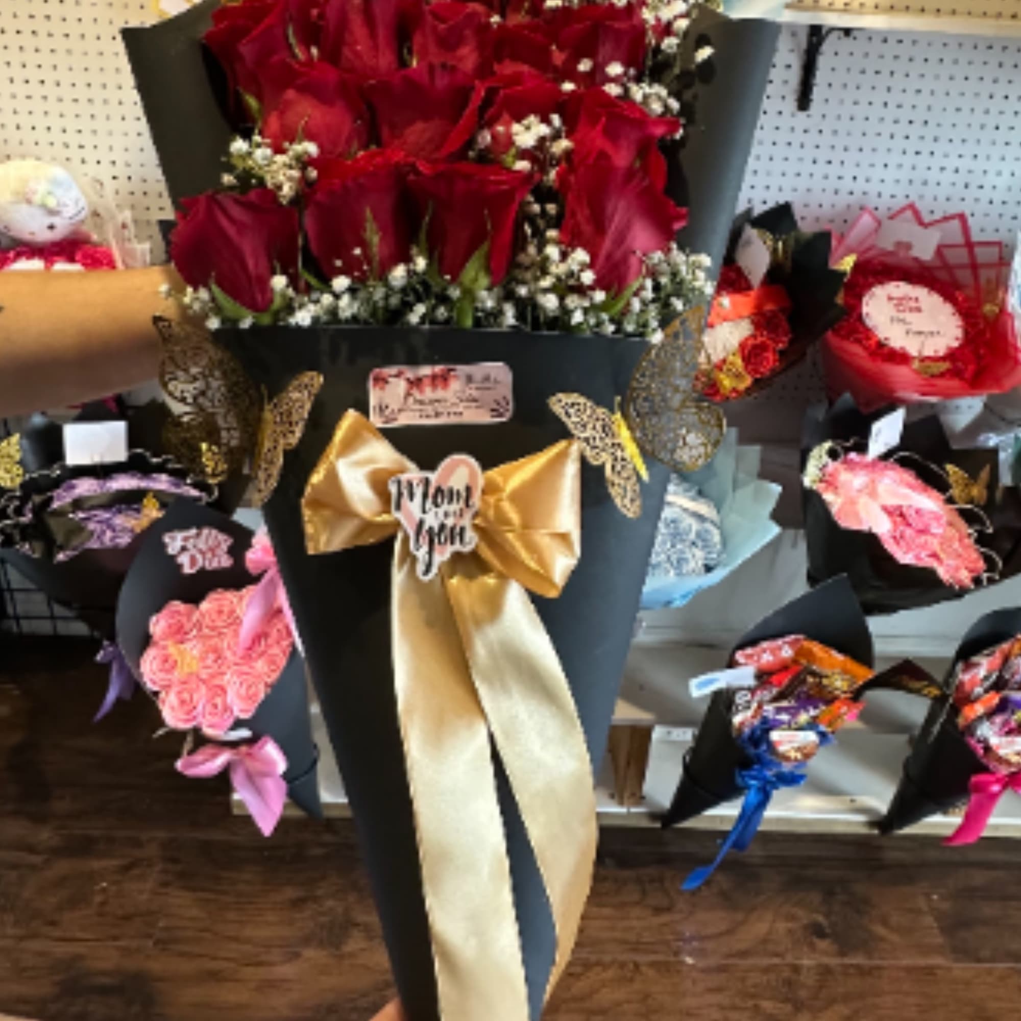 Elegant bouquet of 20 red roses wrapped in black