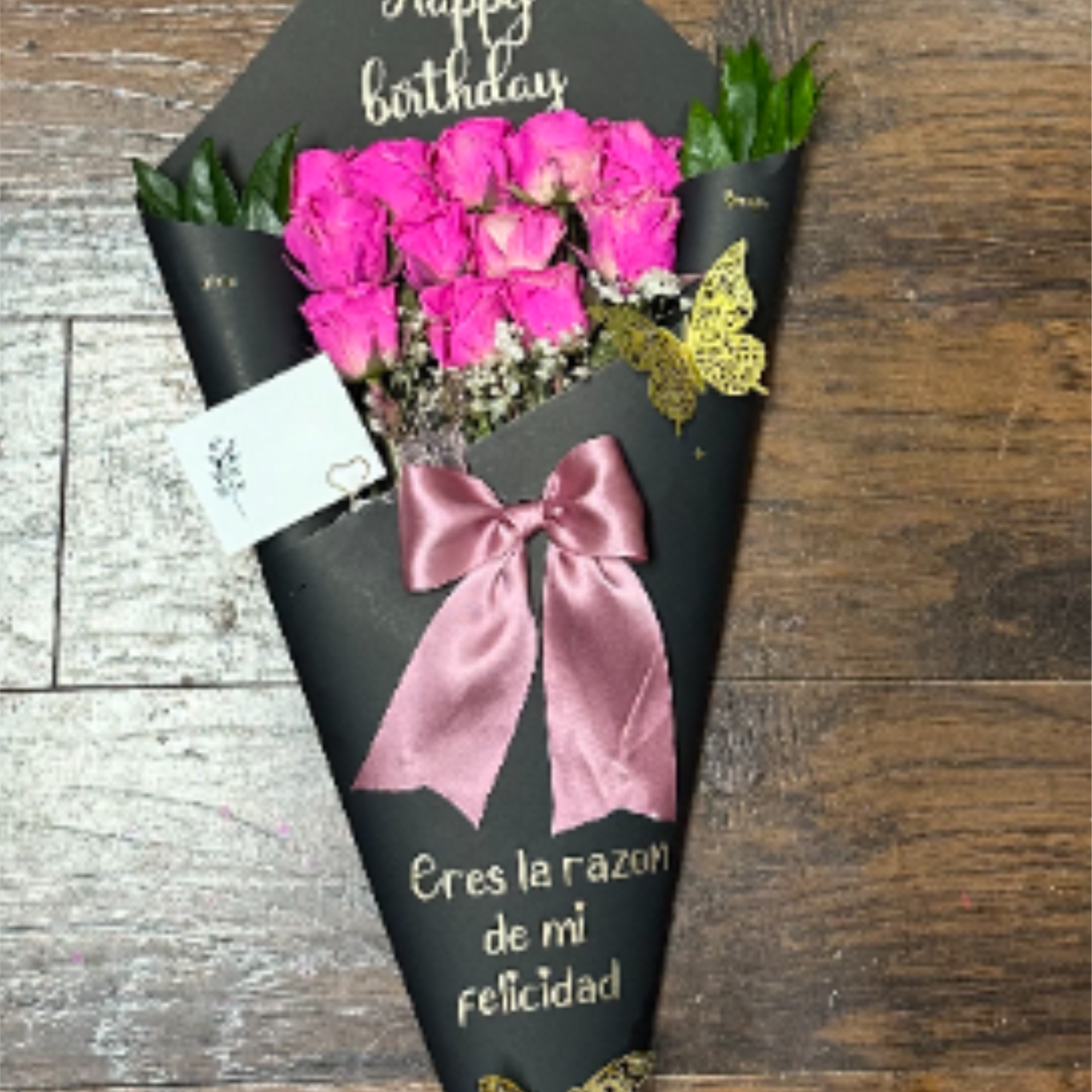 Elegant bouquet of 12 roses wrapped in black