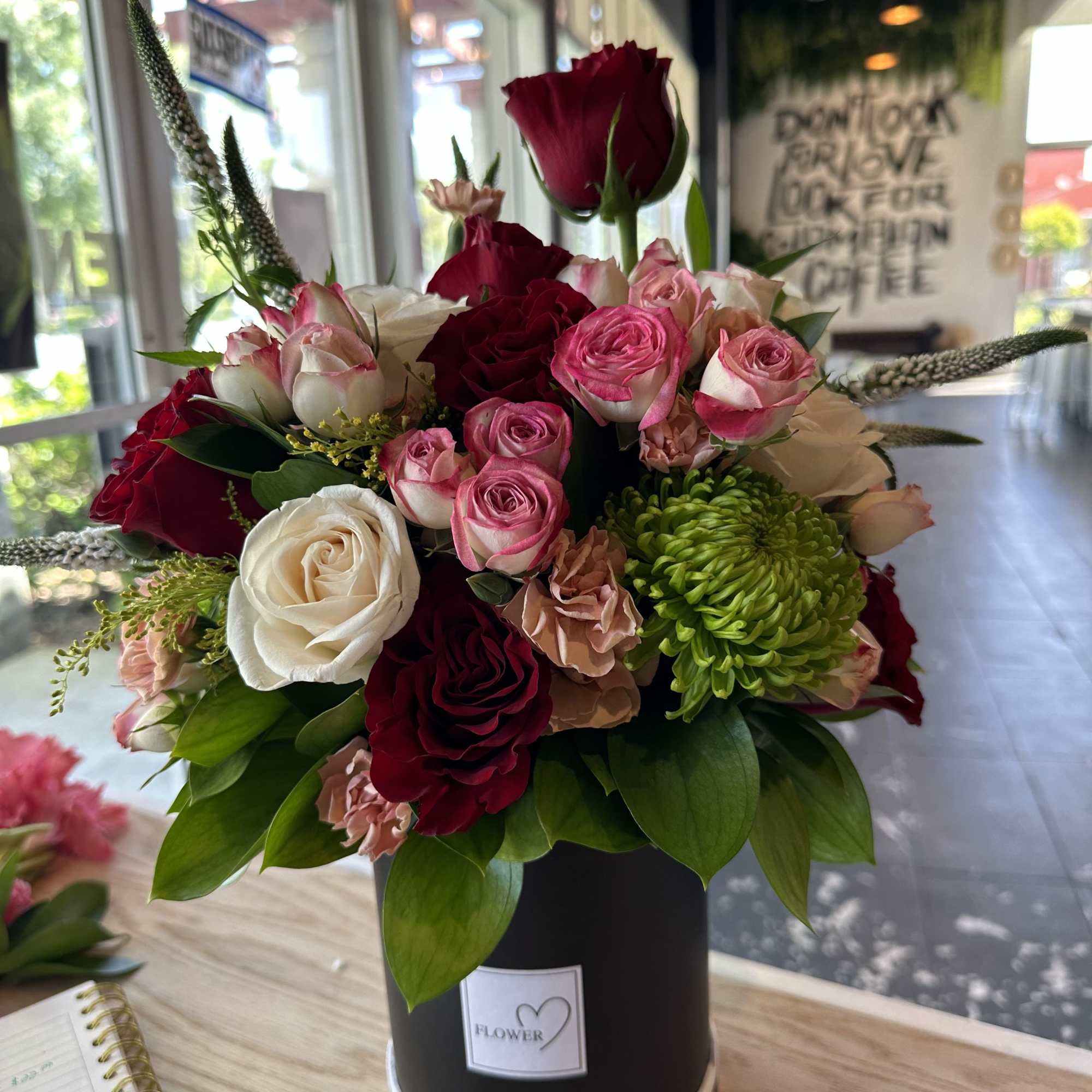 Crimson Grace is a rich and elegant floral arrangement designed in a