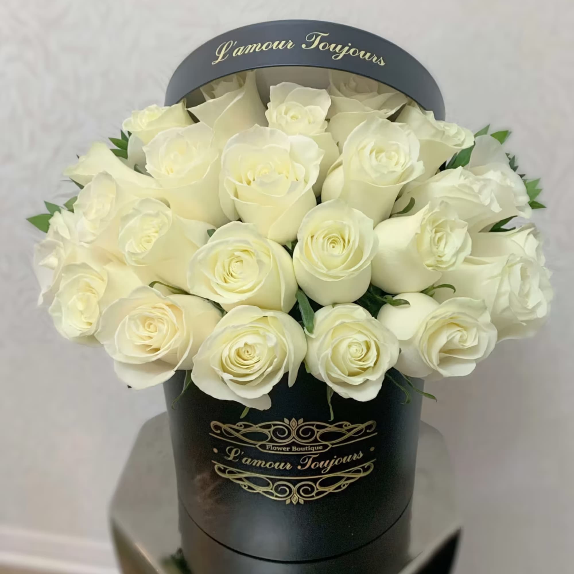 25 Fresh Roses in our Signature Box