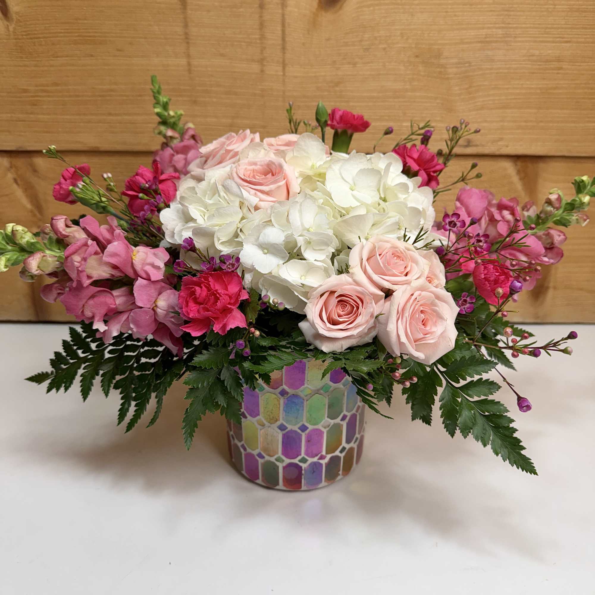 Delicate and graceful, the Blushing Blooms brings a shimmering charm to any