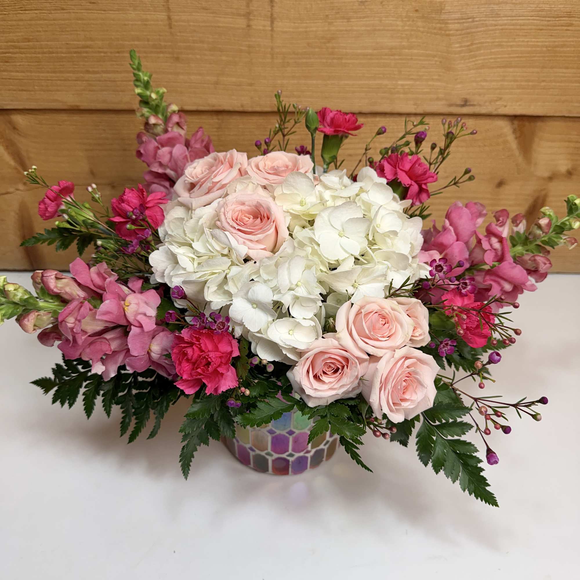 Delicate and graceful, the Blushing Blooms brings a shimmering charm to any