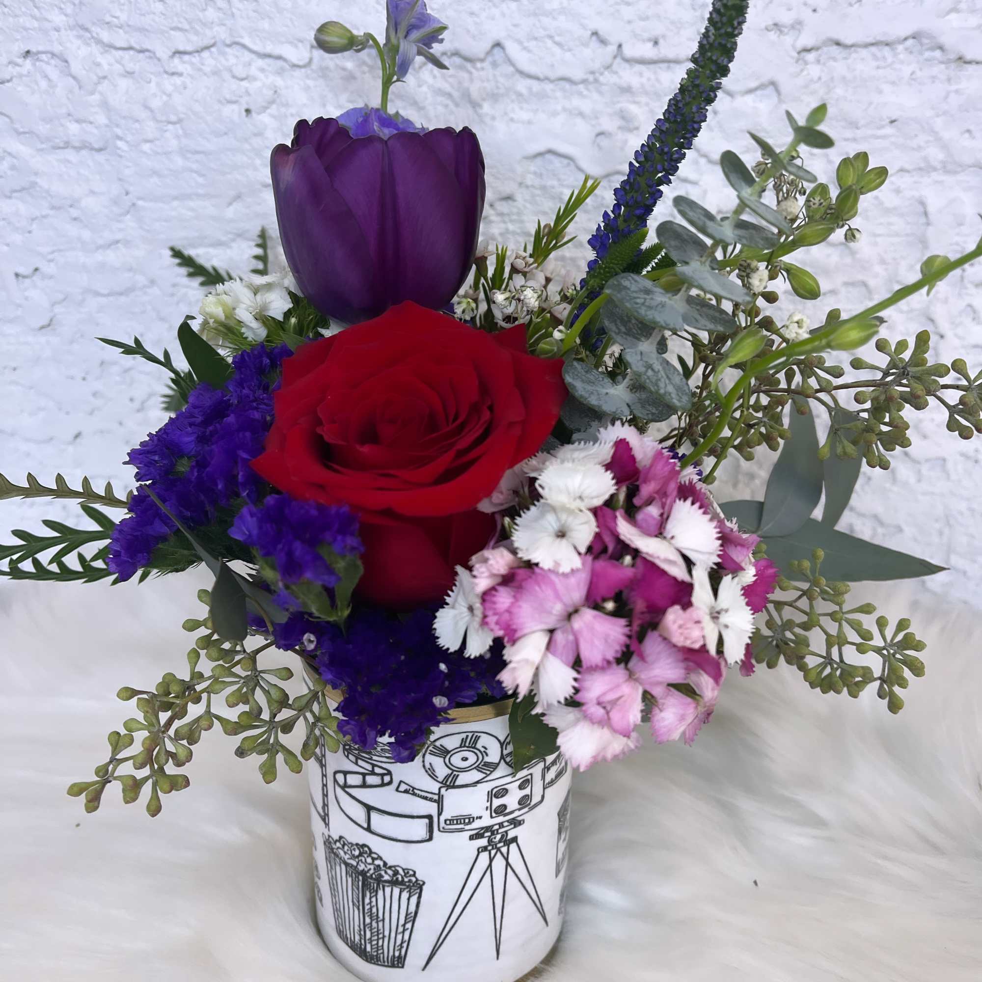 Cans full of love decorated with fresh seasonal flowers.

With our special and