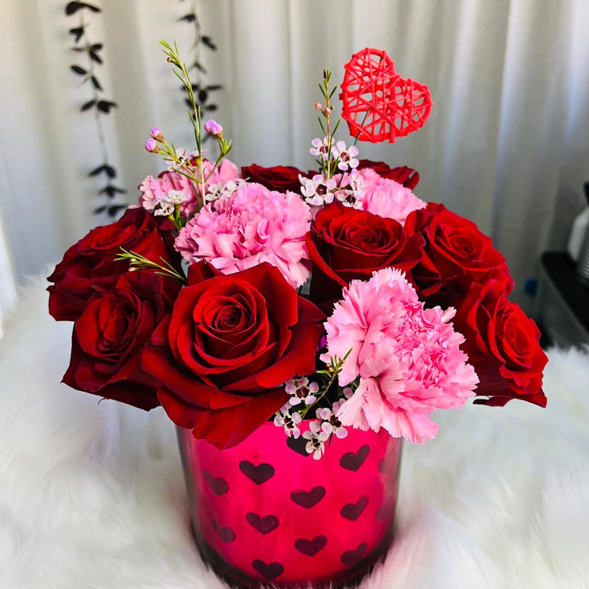 The vow of love

Sweetheart Surprise
Celebrate love with this romantic arrangement featuring classic