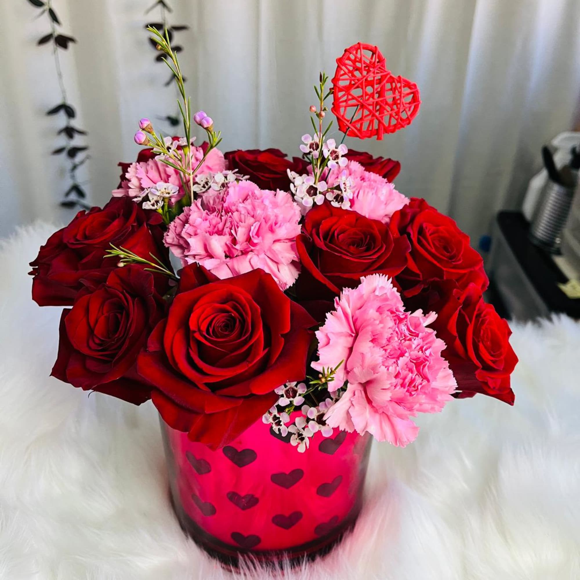 The vow of love

Sweetheart Surprise
Celebrate love with this romantic arrangement featuring classic